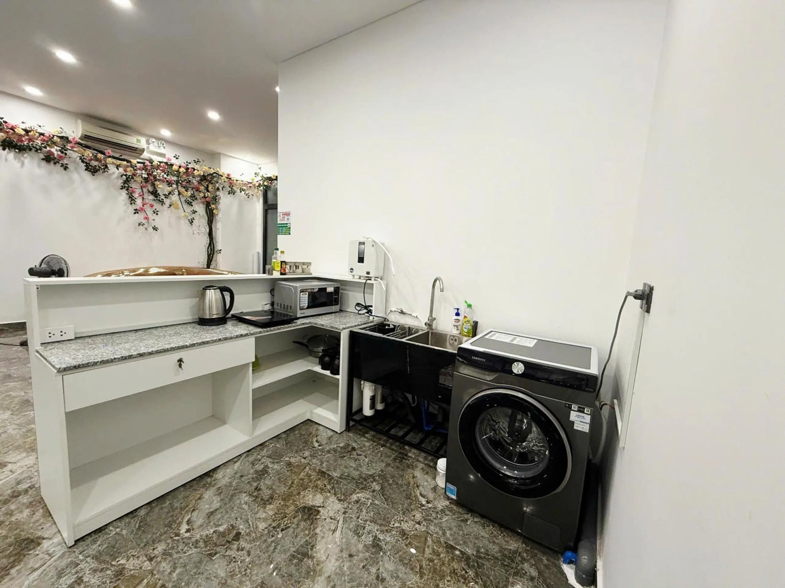 Communal kitchen in Lalisa Hotel Grand World Phu Quoc