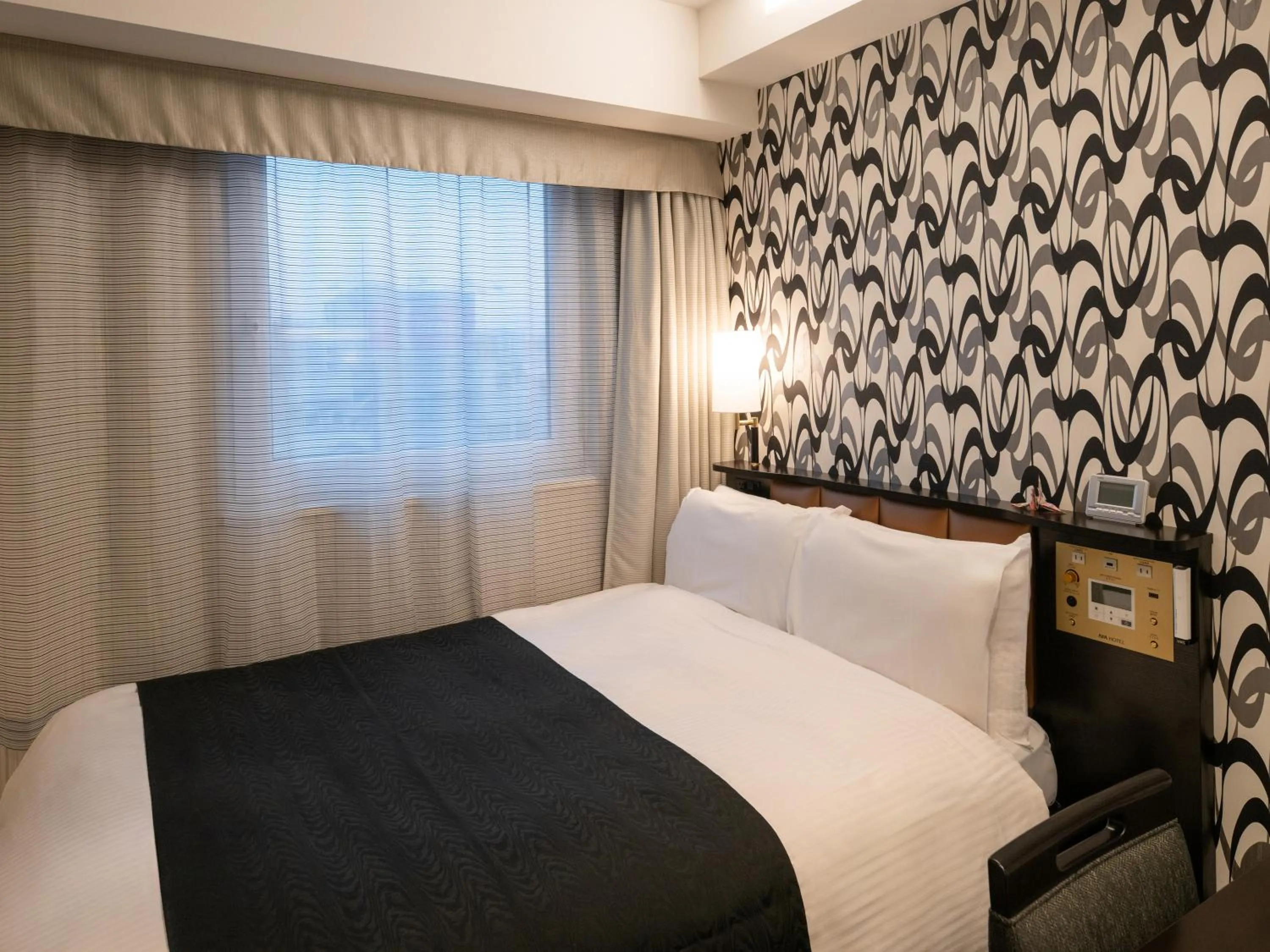 Photo of the whole room, Bed in APA Hotel Asakusa Shin Okachimachi Ekimae