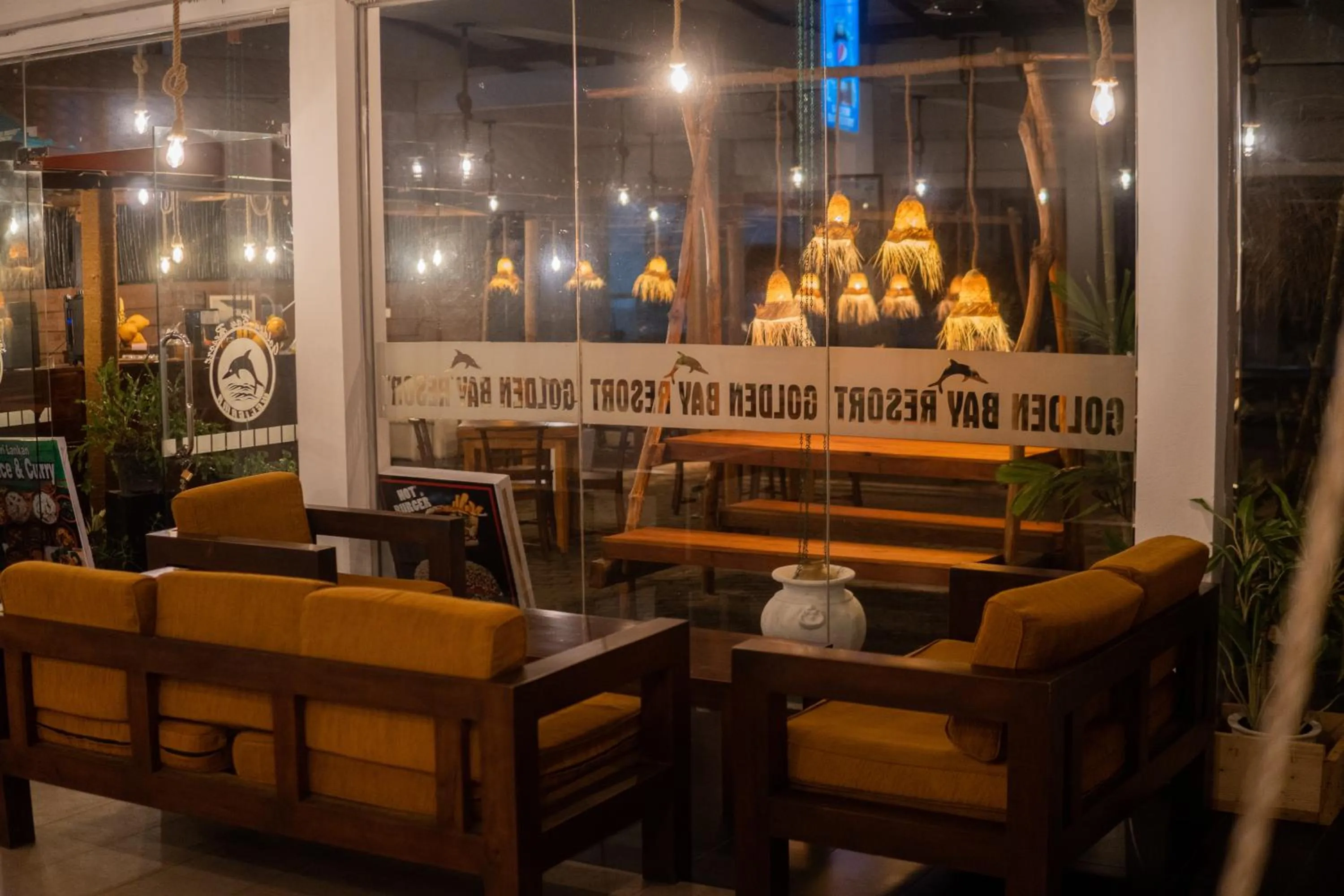 Seating area in New Golden Bay Resort Weligama