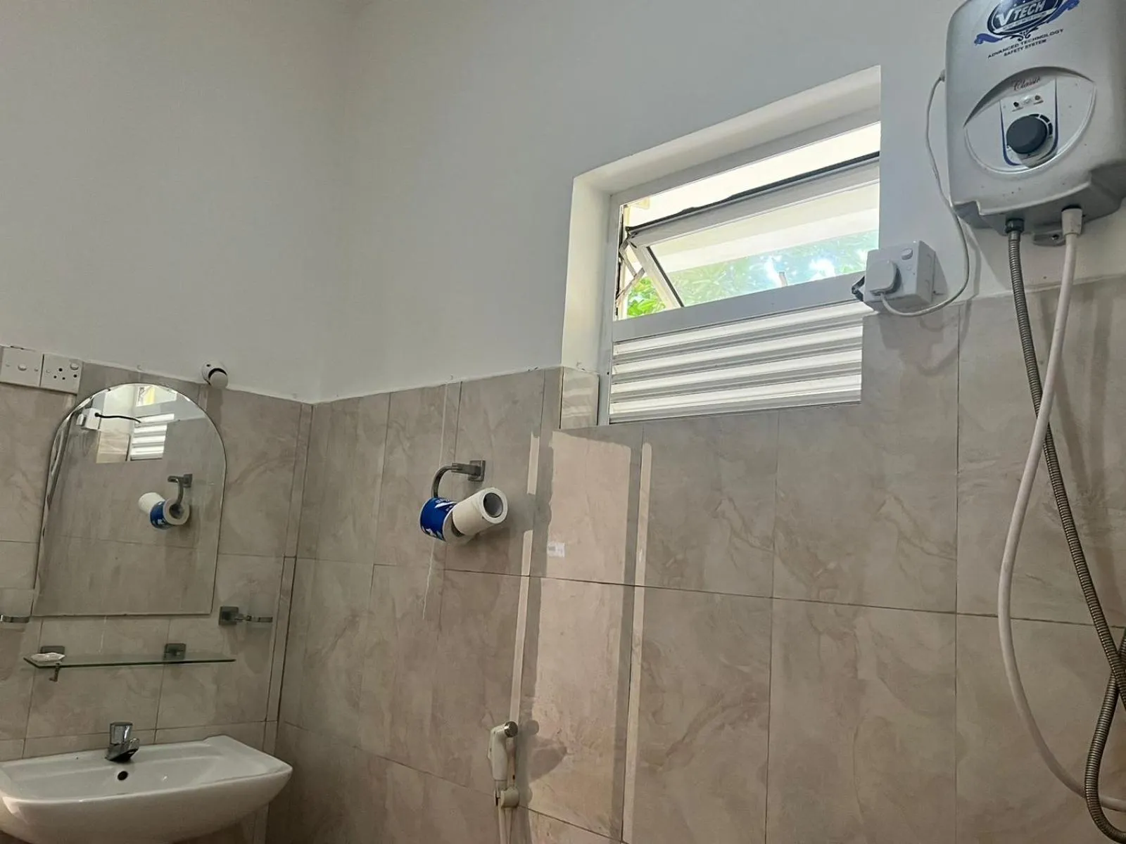 Shower in New Golden Bay Resort Weligama