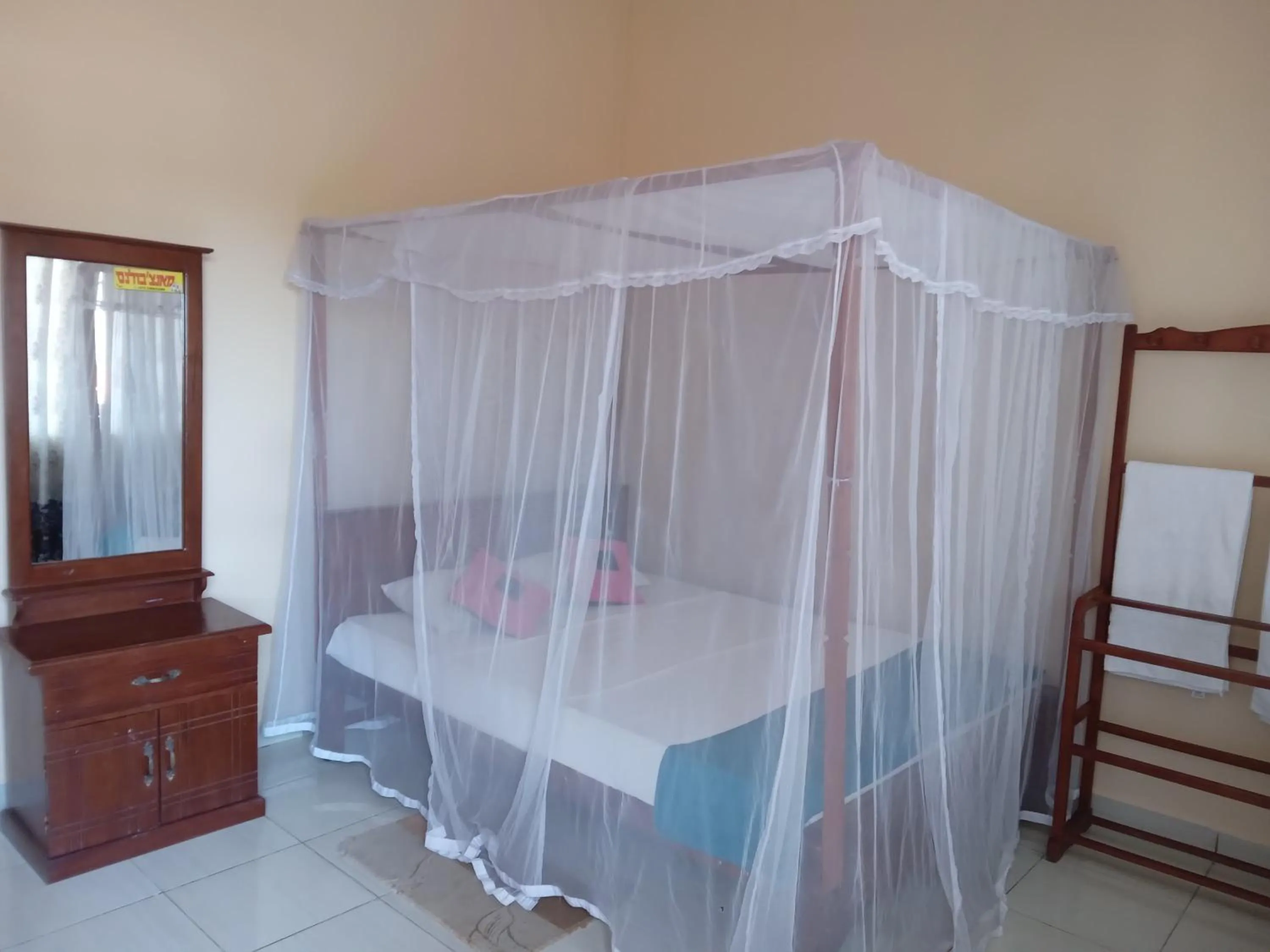 Bed in New Golden Bay Resort Weligama