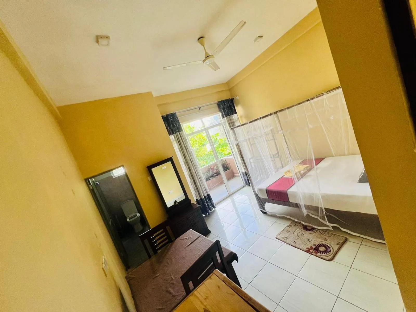 Photo of the whole room, Bed in New Golden Bay Resort Weligama