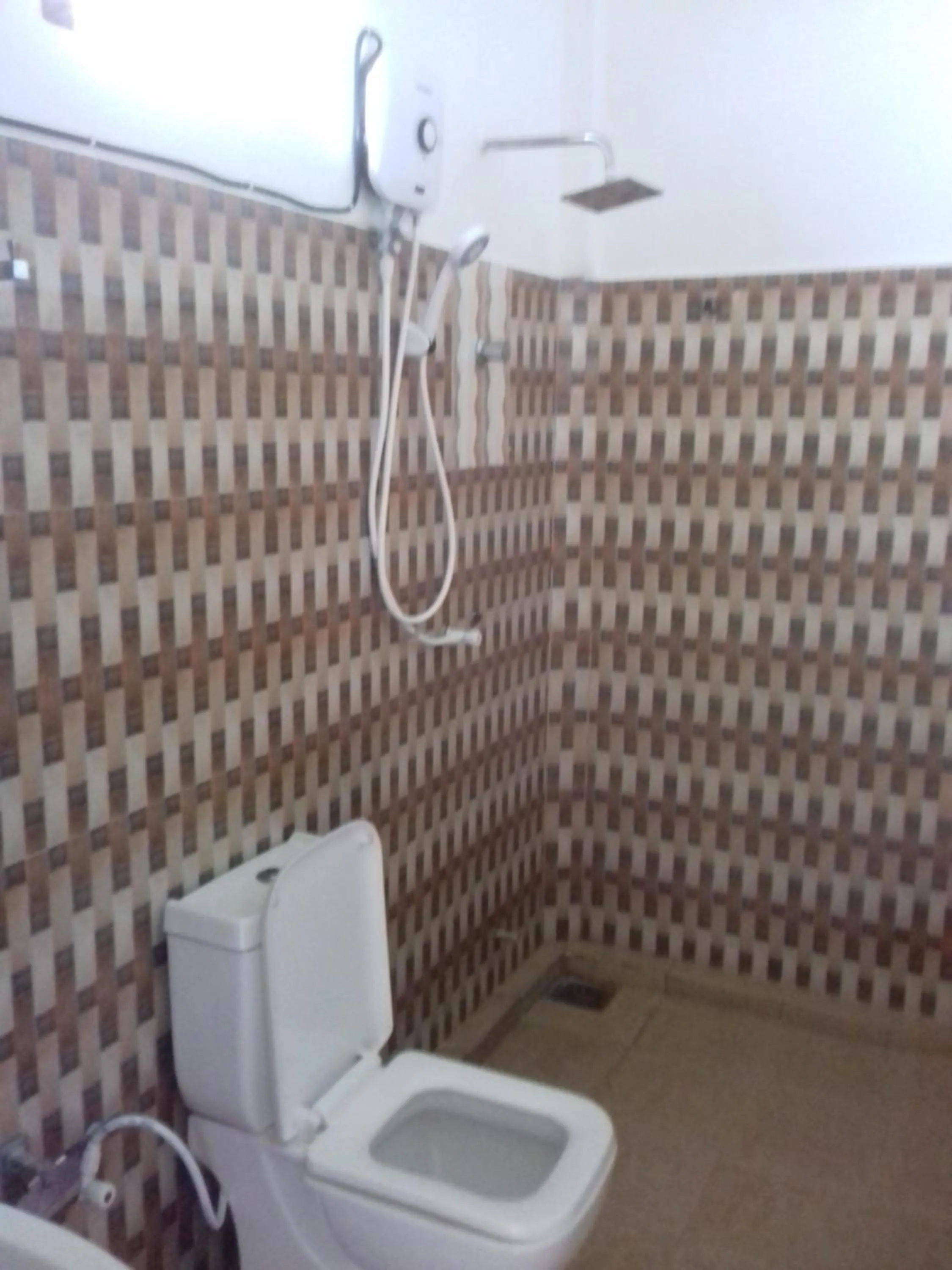 Shower in New Golden Bay Resort Weligama