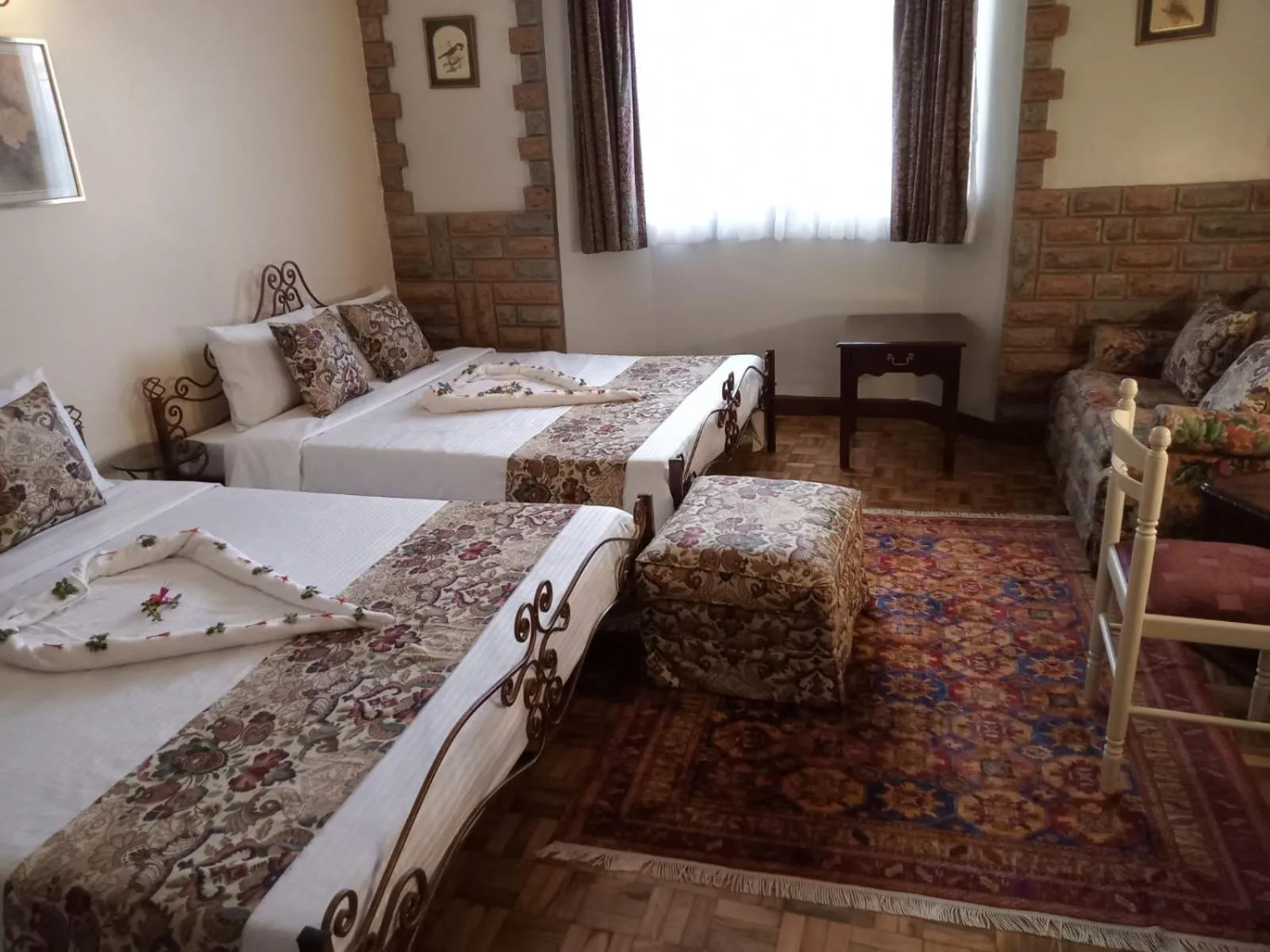 Seating area, Bed in The Drexel House Kenya