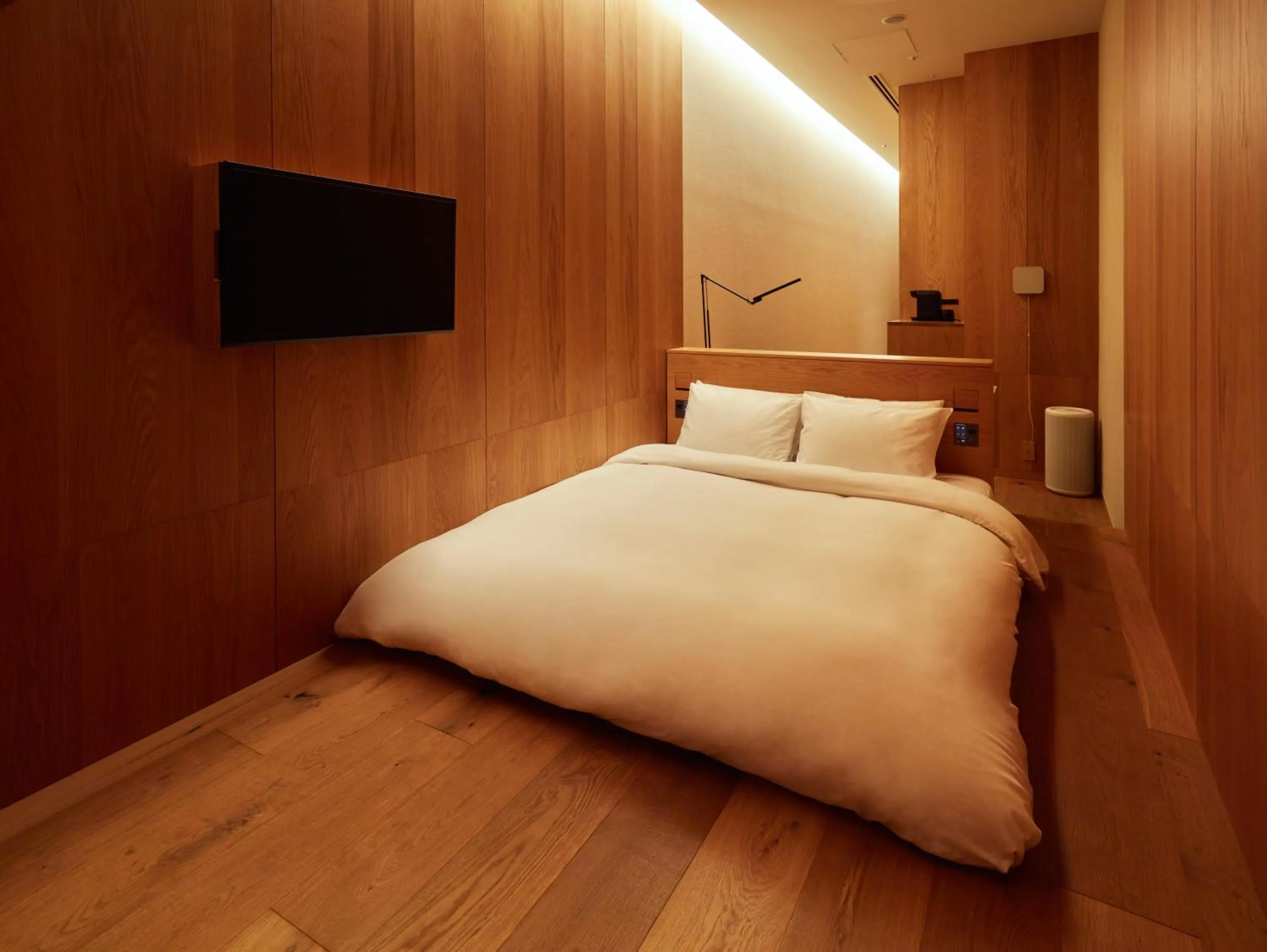 Bed in MUJI HOTEL GINZA