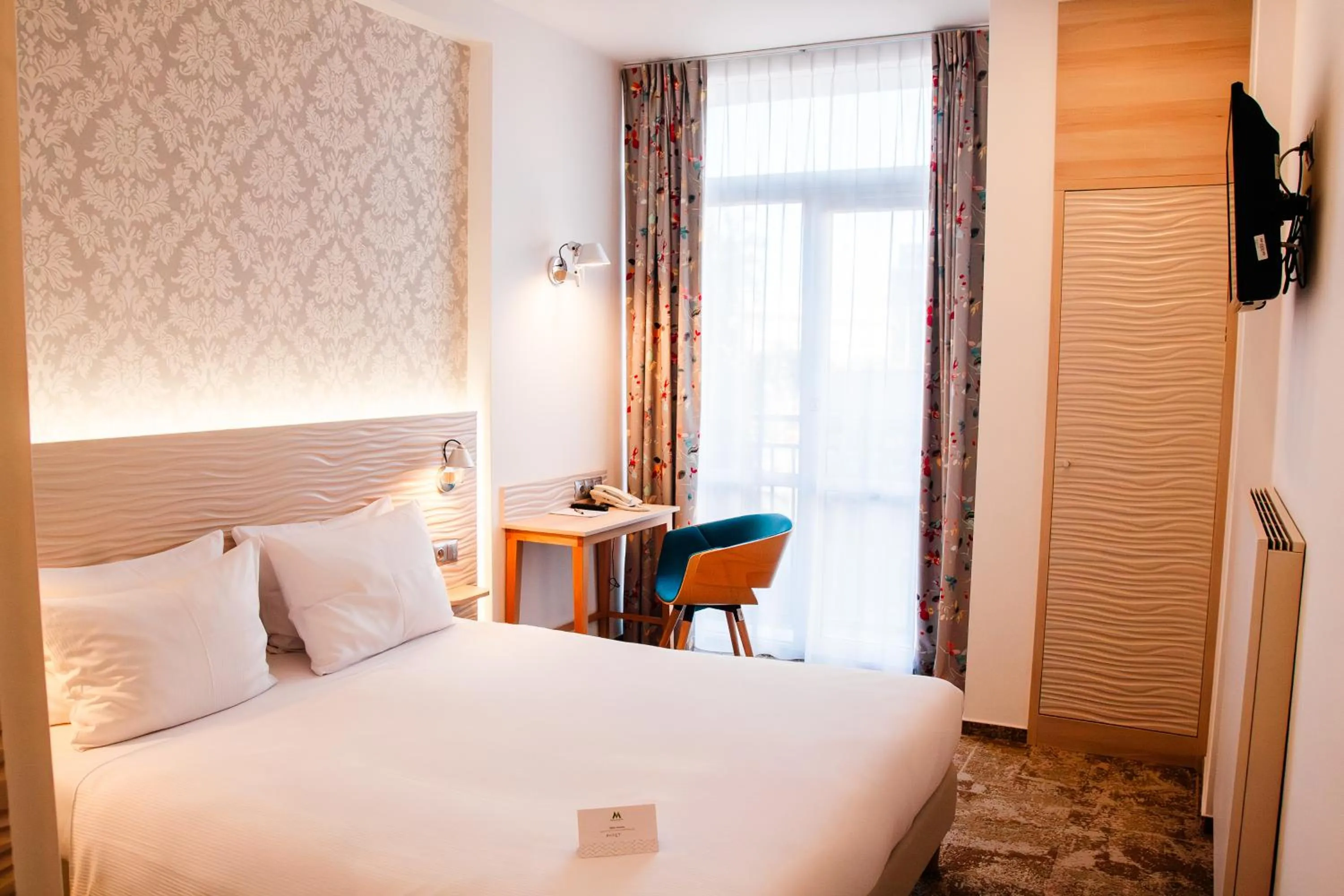 Bed in Hotel Metropol