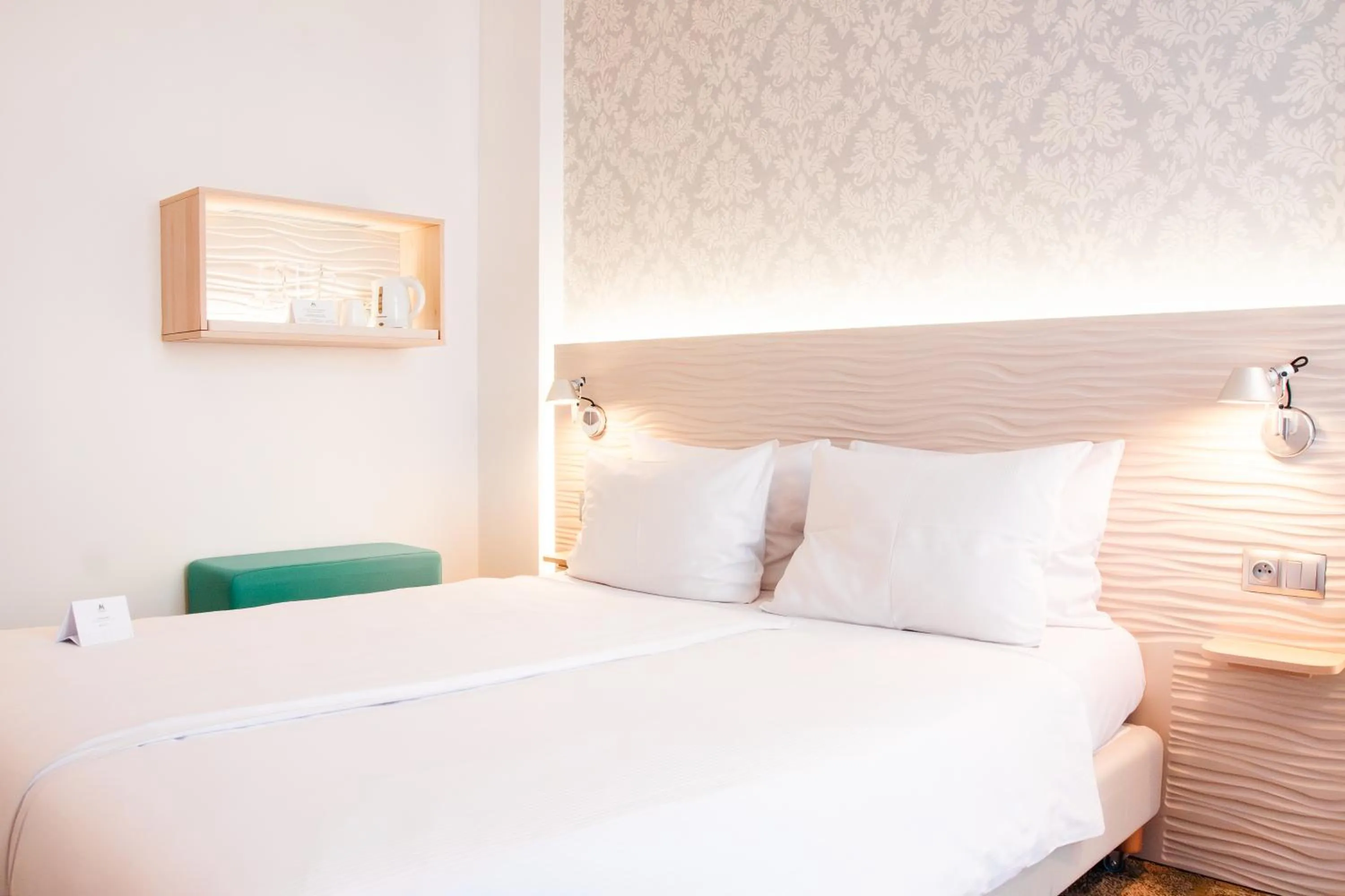 Bed in Hotel Metropol