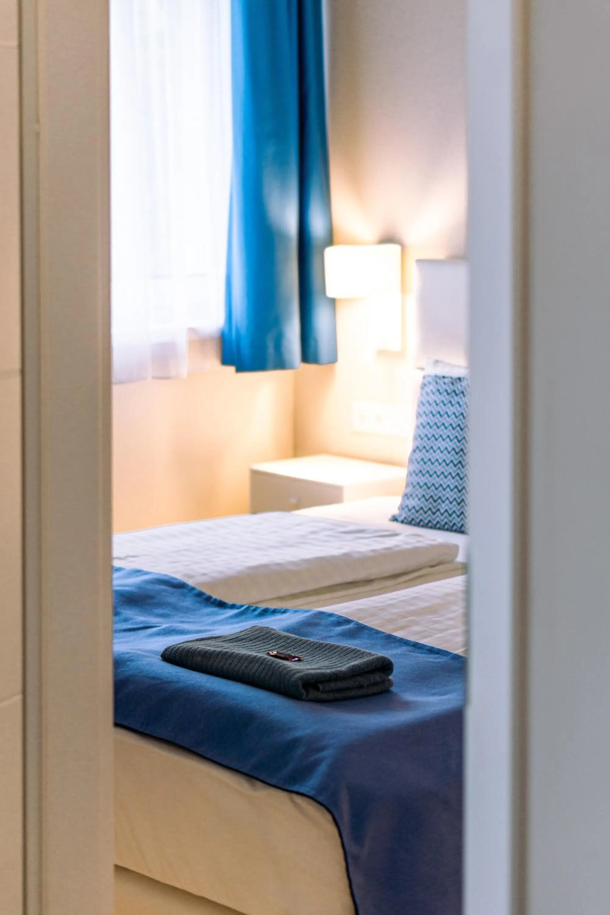 Bed in Lake Spirit Boutique Apartments