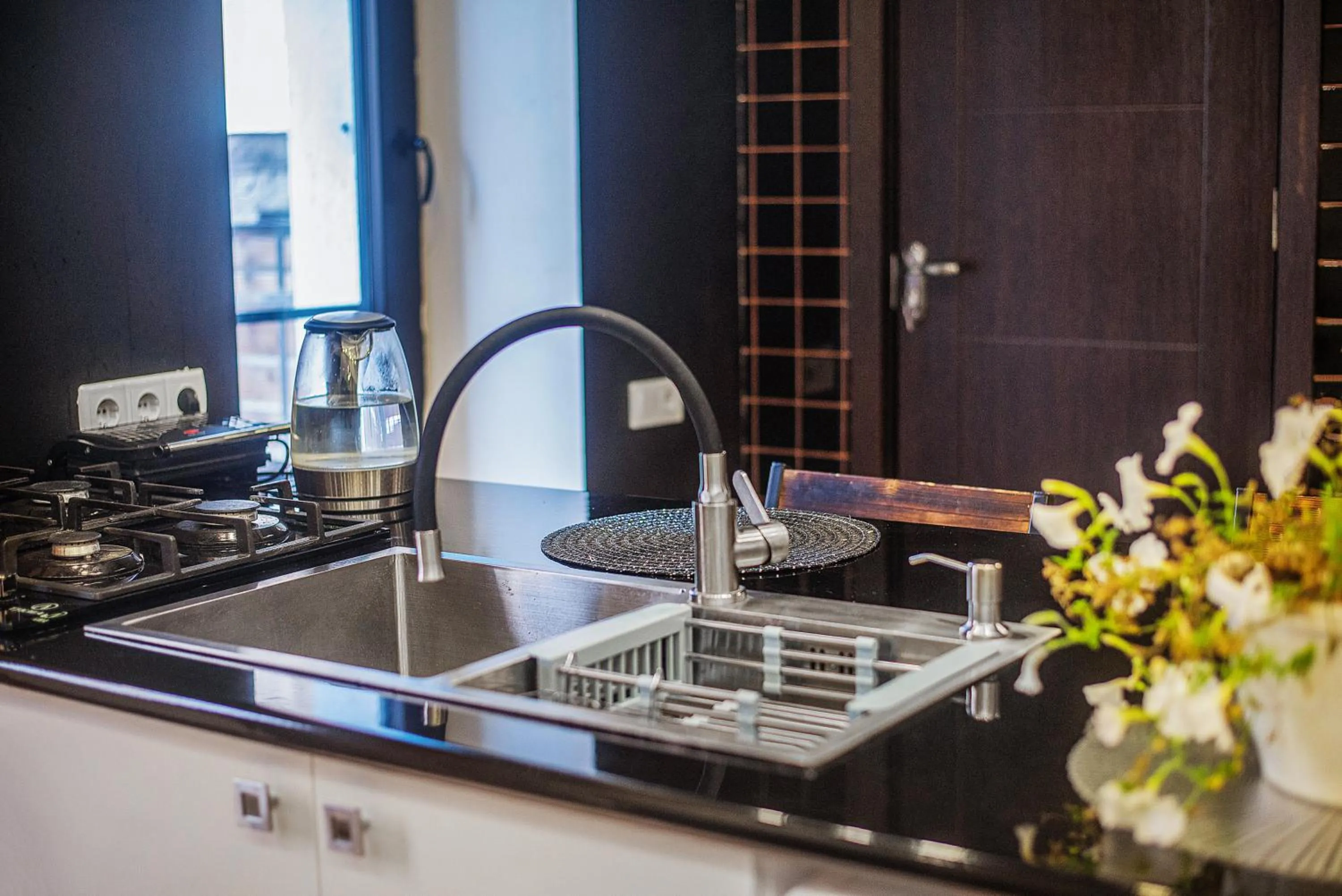 Kitchen or kitchenette in HB apartments Aghmashenebeli