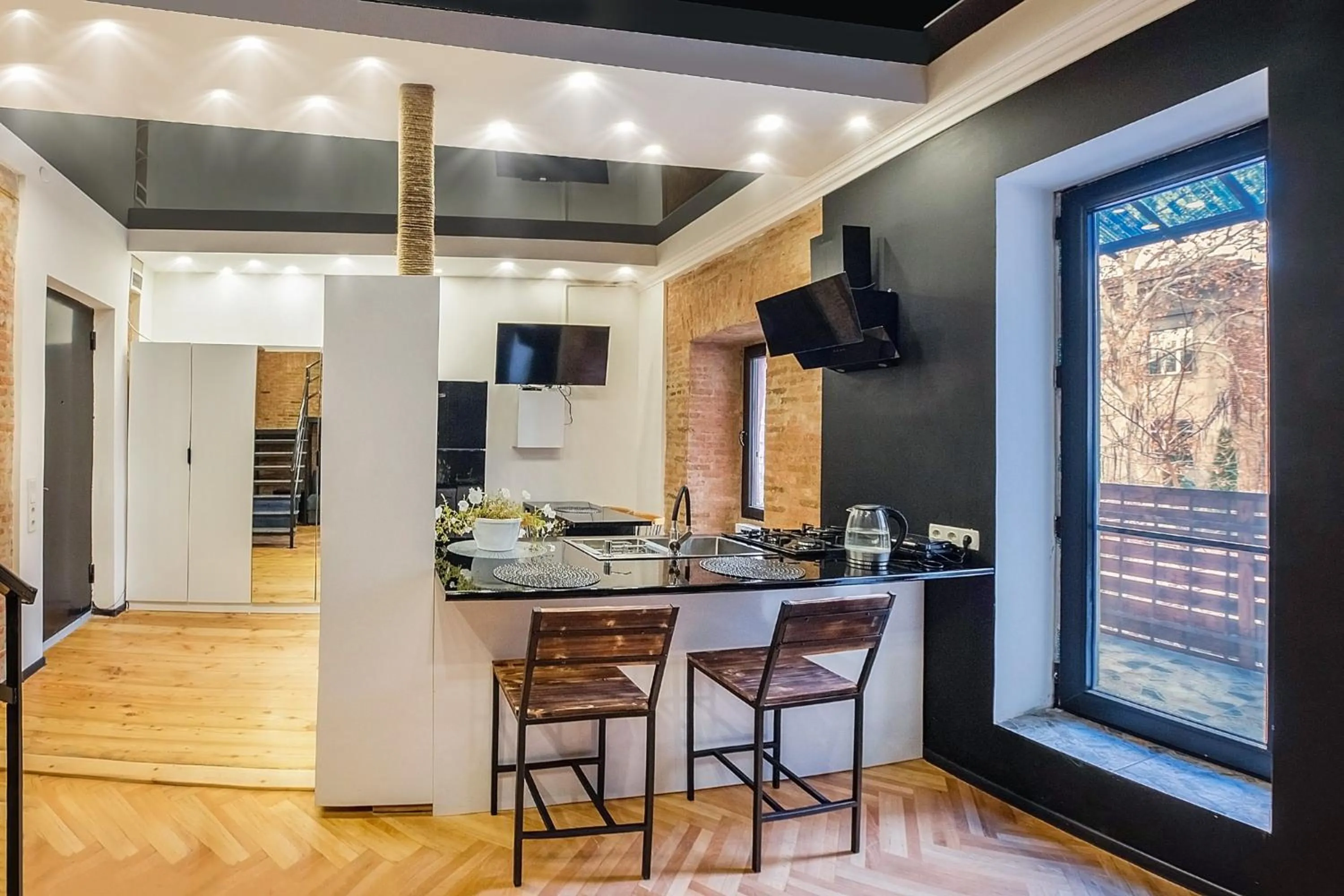 Kitchen or kitchenette in HB apartments Aghmashenebeli