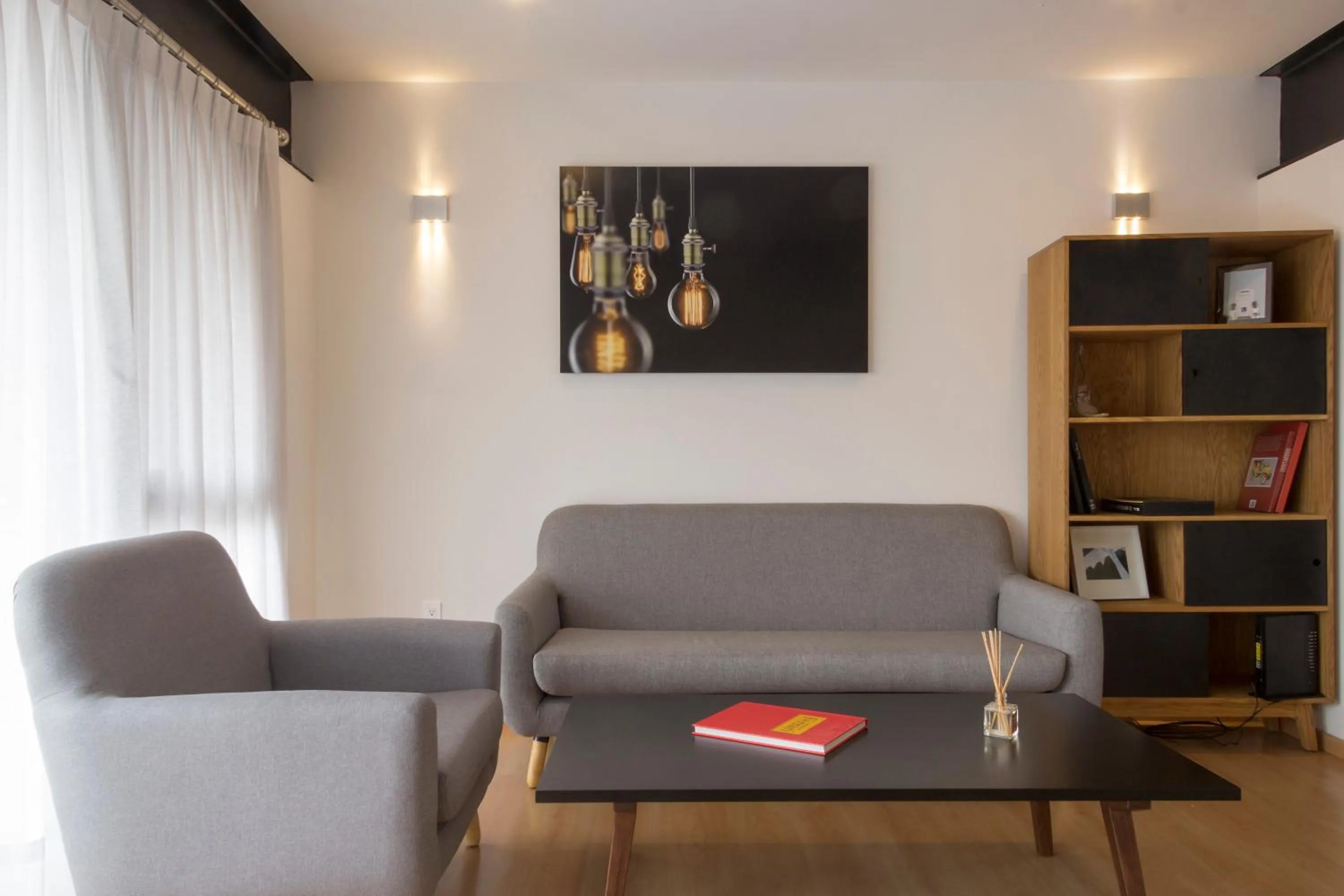 Living room in El Doce by HomiRent