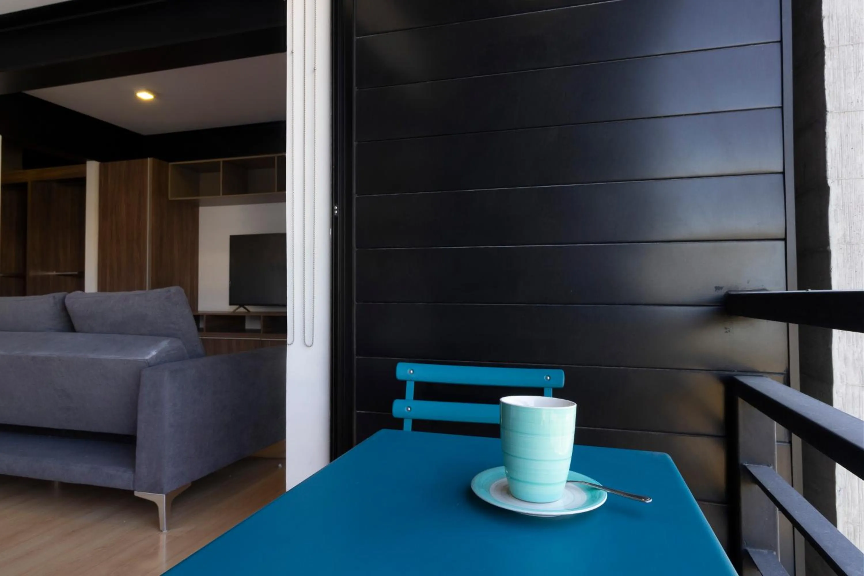 Seating area in El Doce by HomiRent