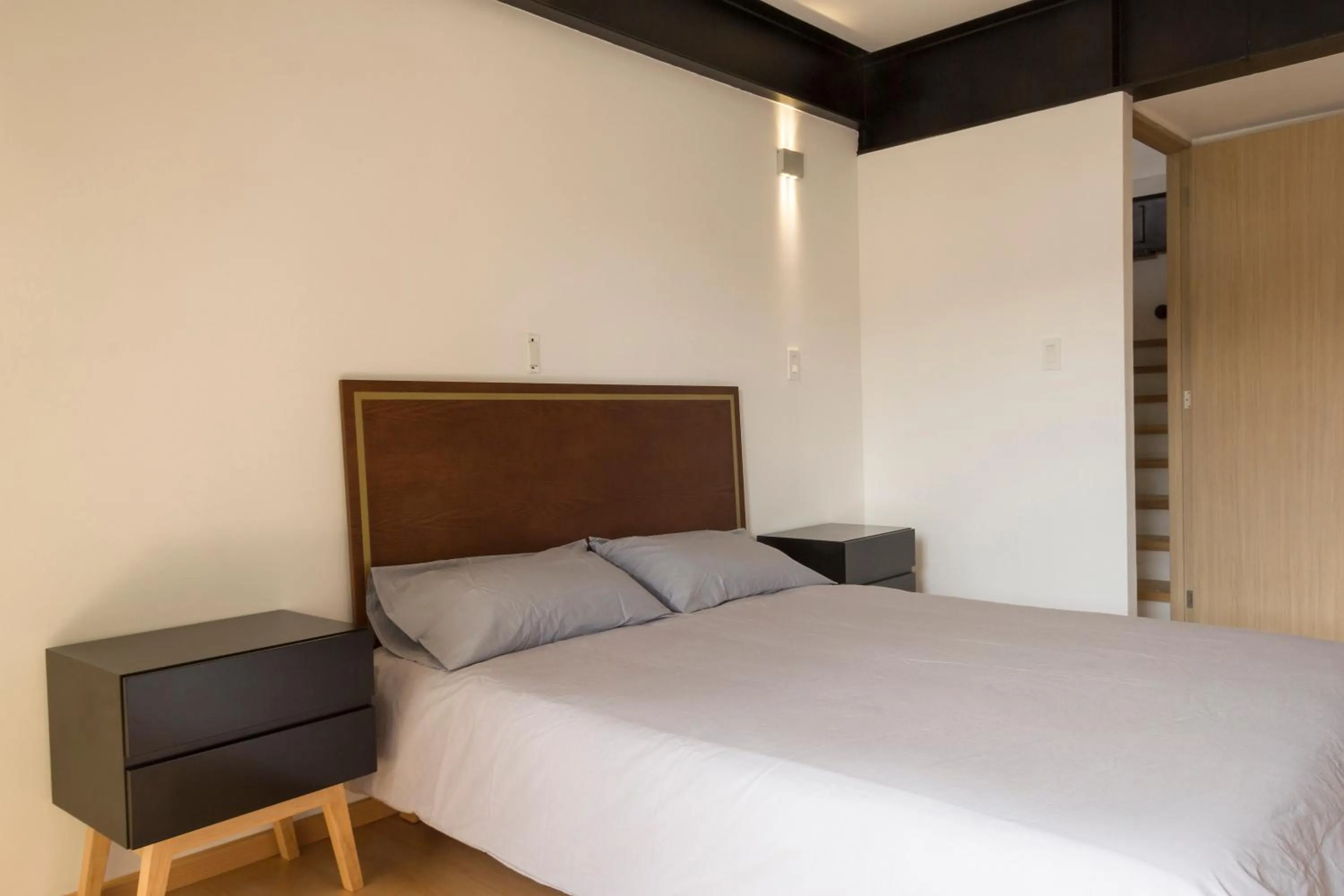 Bed in El Doce by HomiRent