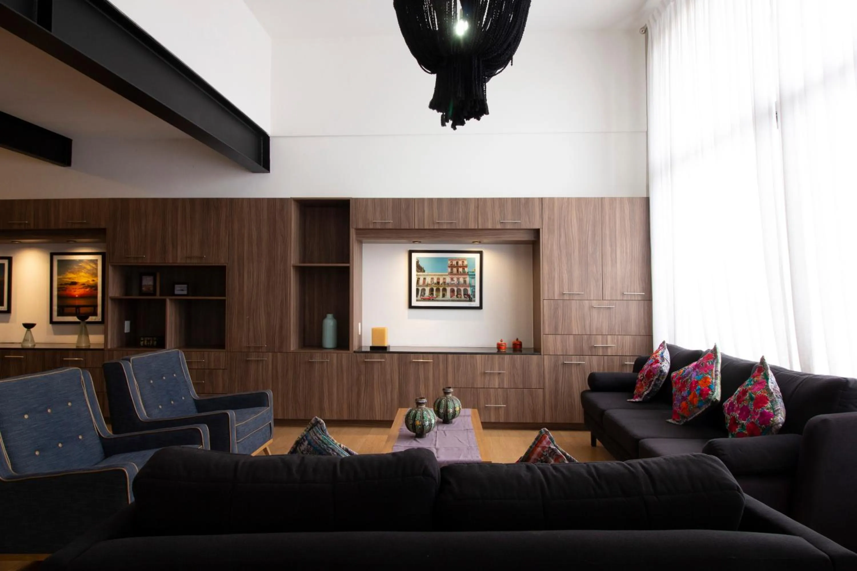 Living room in El Doce by HomiRent