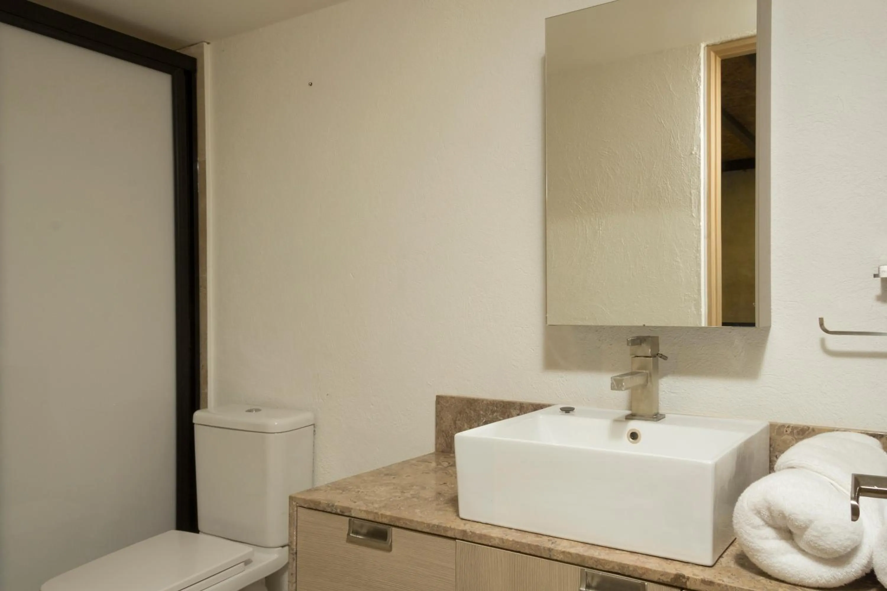 Bathroom in El Doce by HomiRent