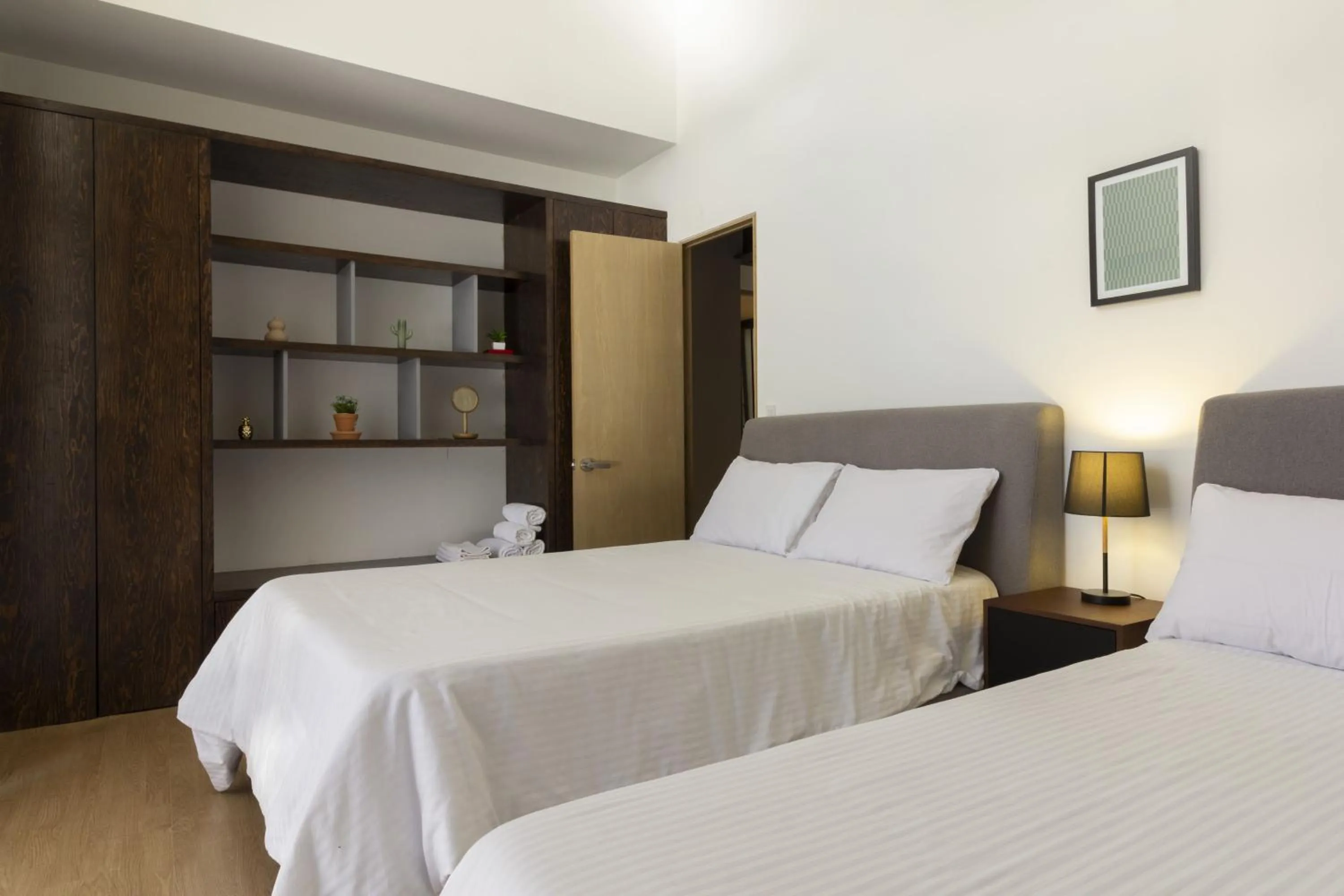 Photo of the whole room, Bed in El Doce by HomiRent