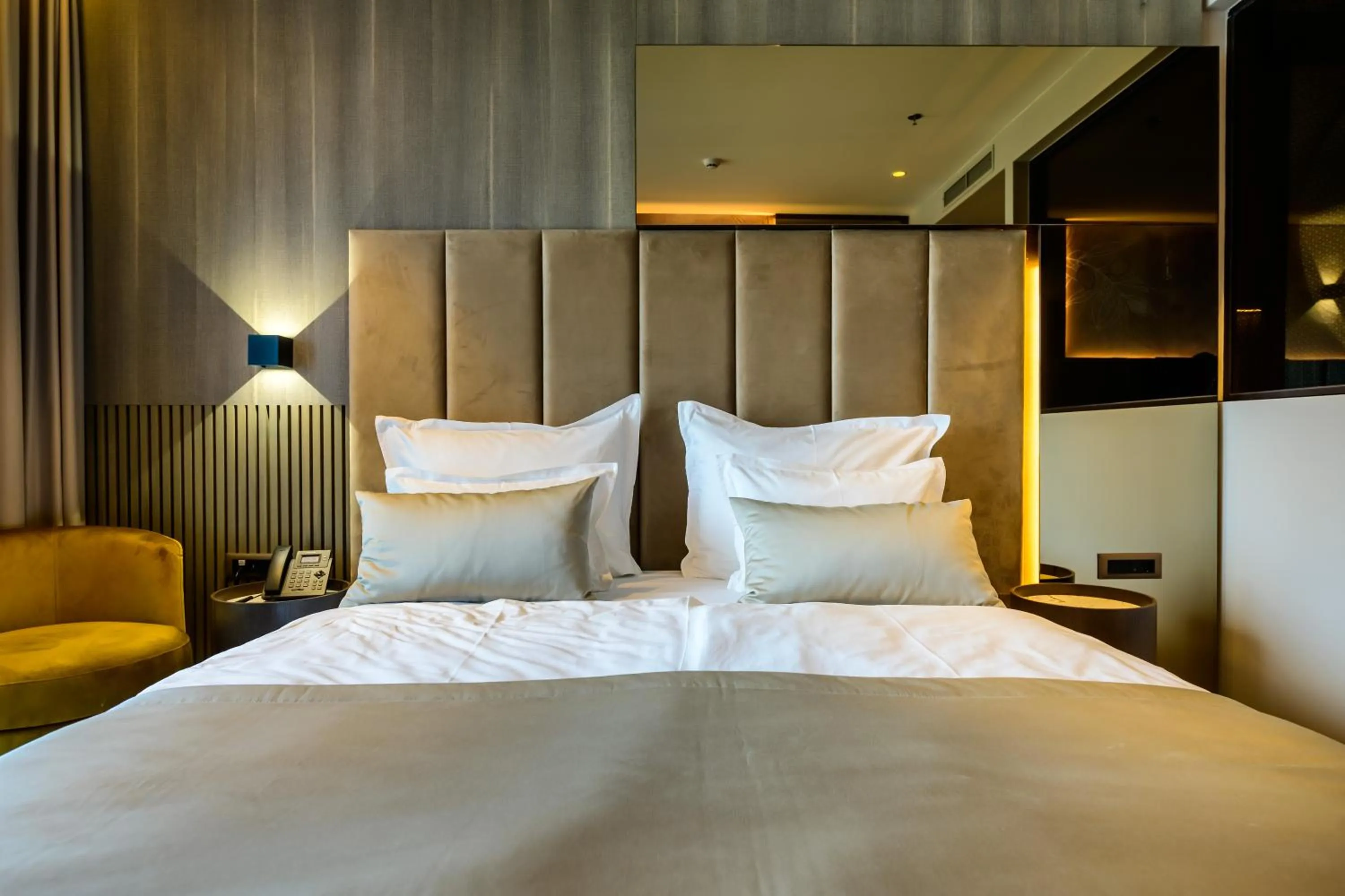 Bed in Marinus Beach Hotel