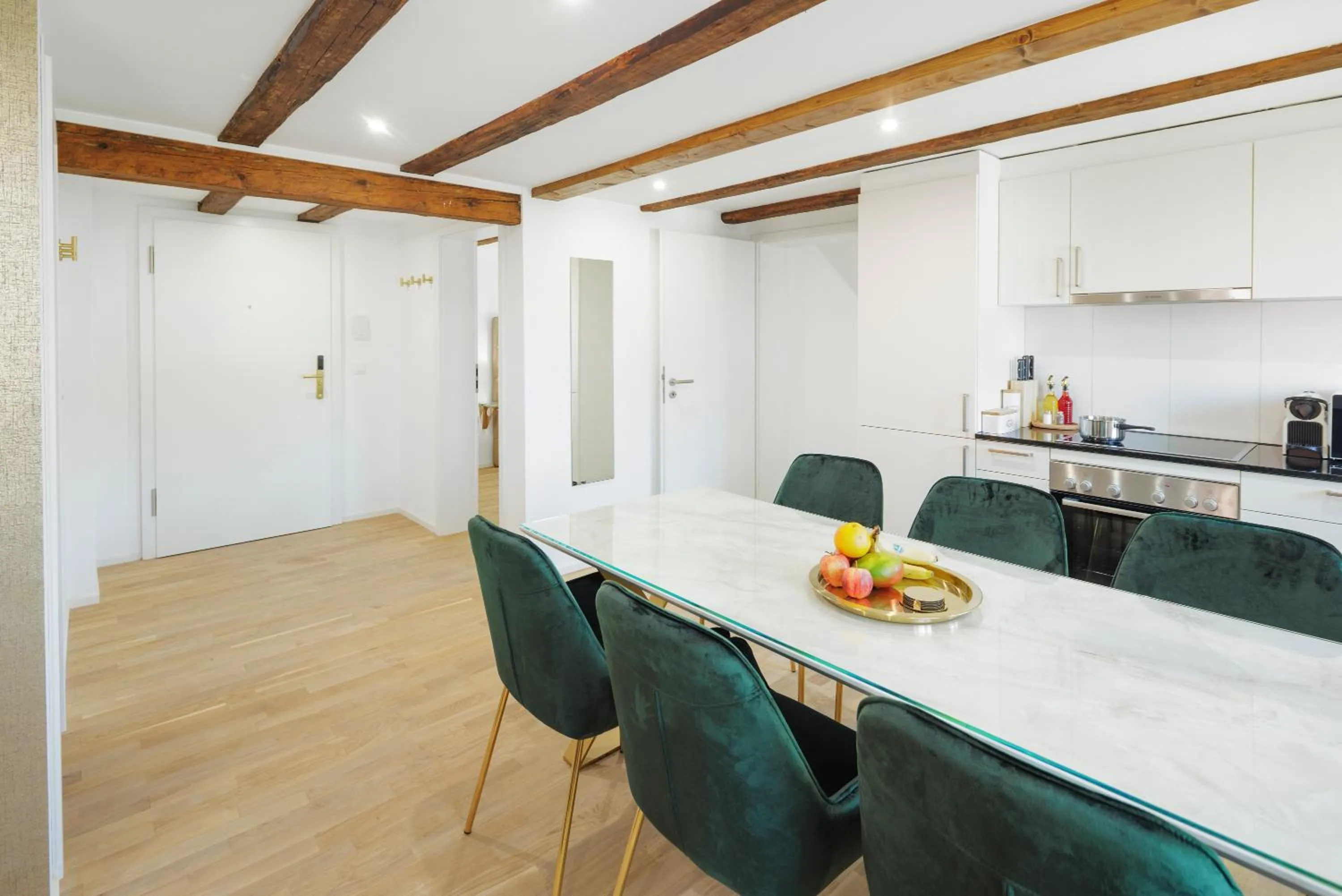 Kitchen or kitchenette in VISIMO Apartments Steigerstrasse St Gallen - Modern Living near OLMA & Hospital