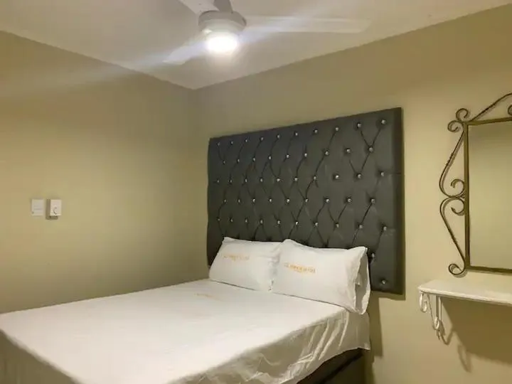 Bed in Glamour Hotel