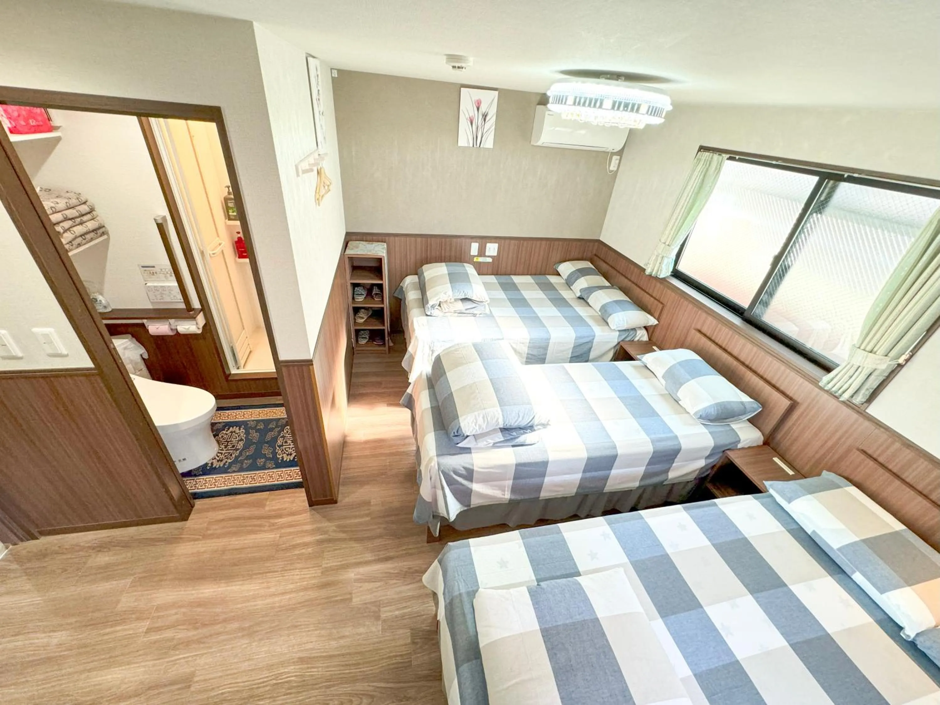 Bed in SHINJUKU WARM VILLA I