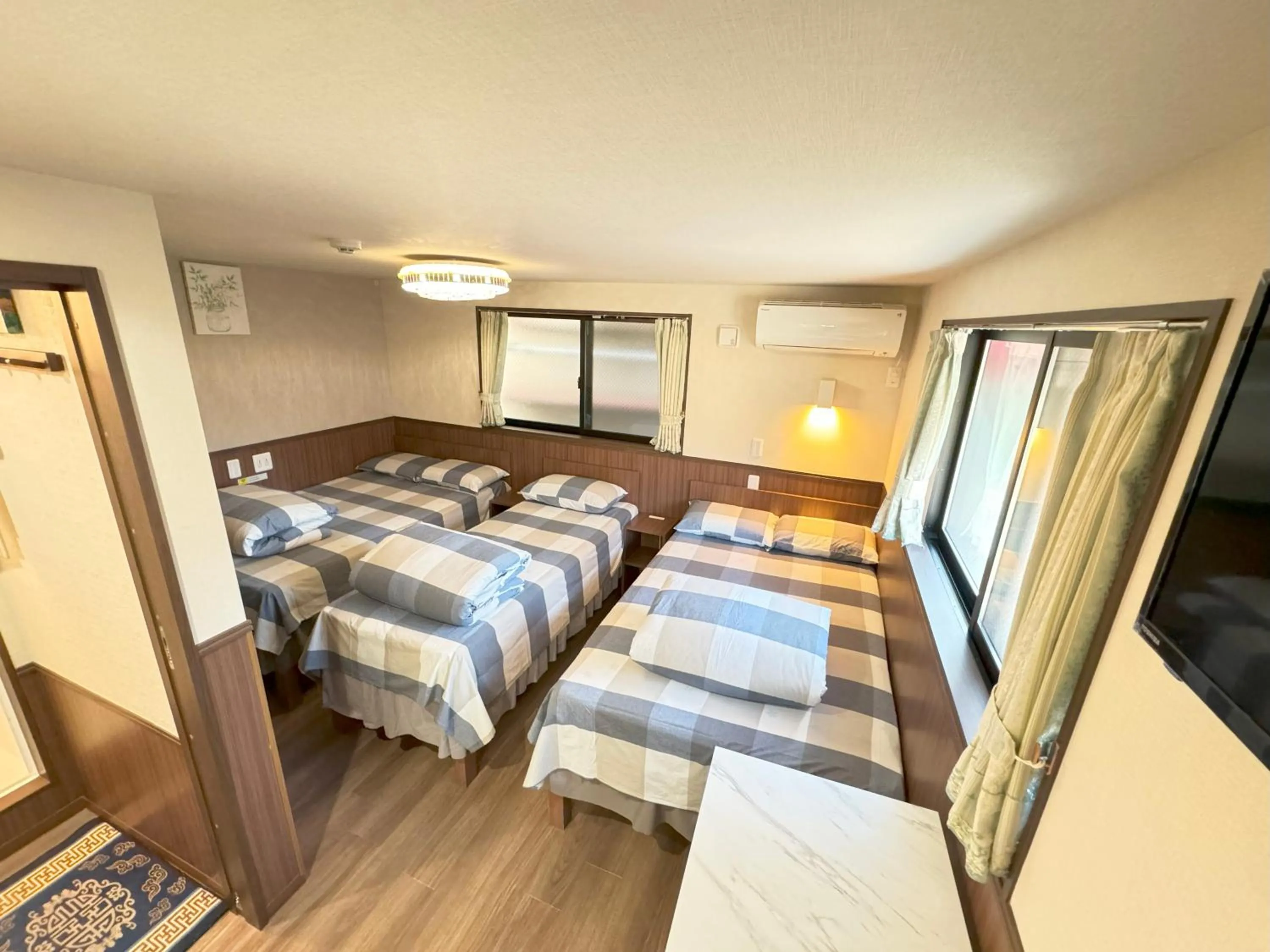 Bed in SHINJUKU WARM VILLA I