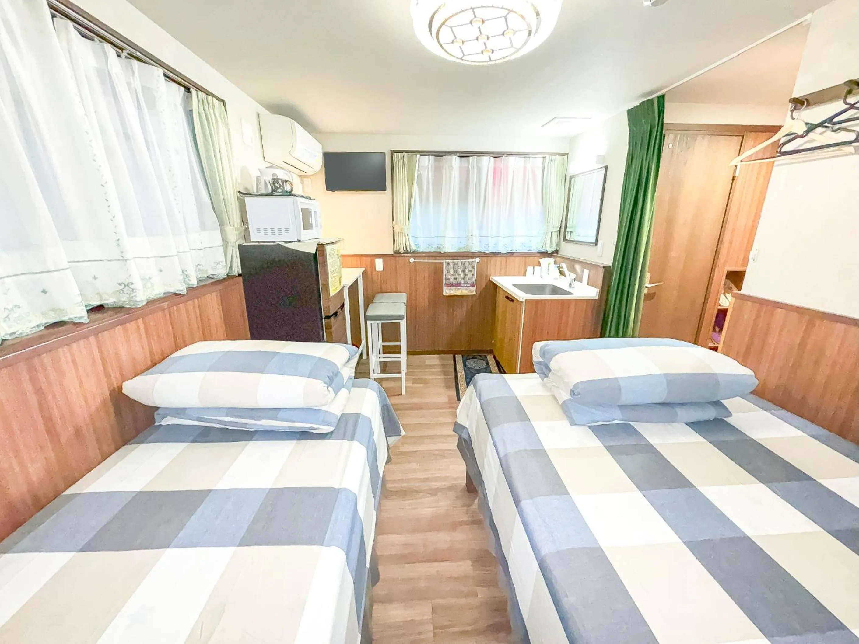 Bed in SHINJUKU WARM VILLA I