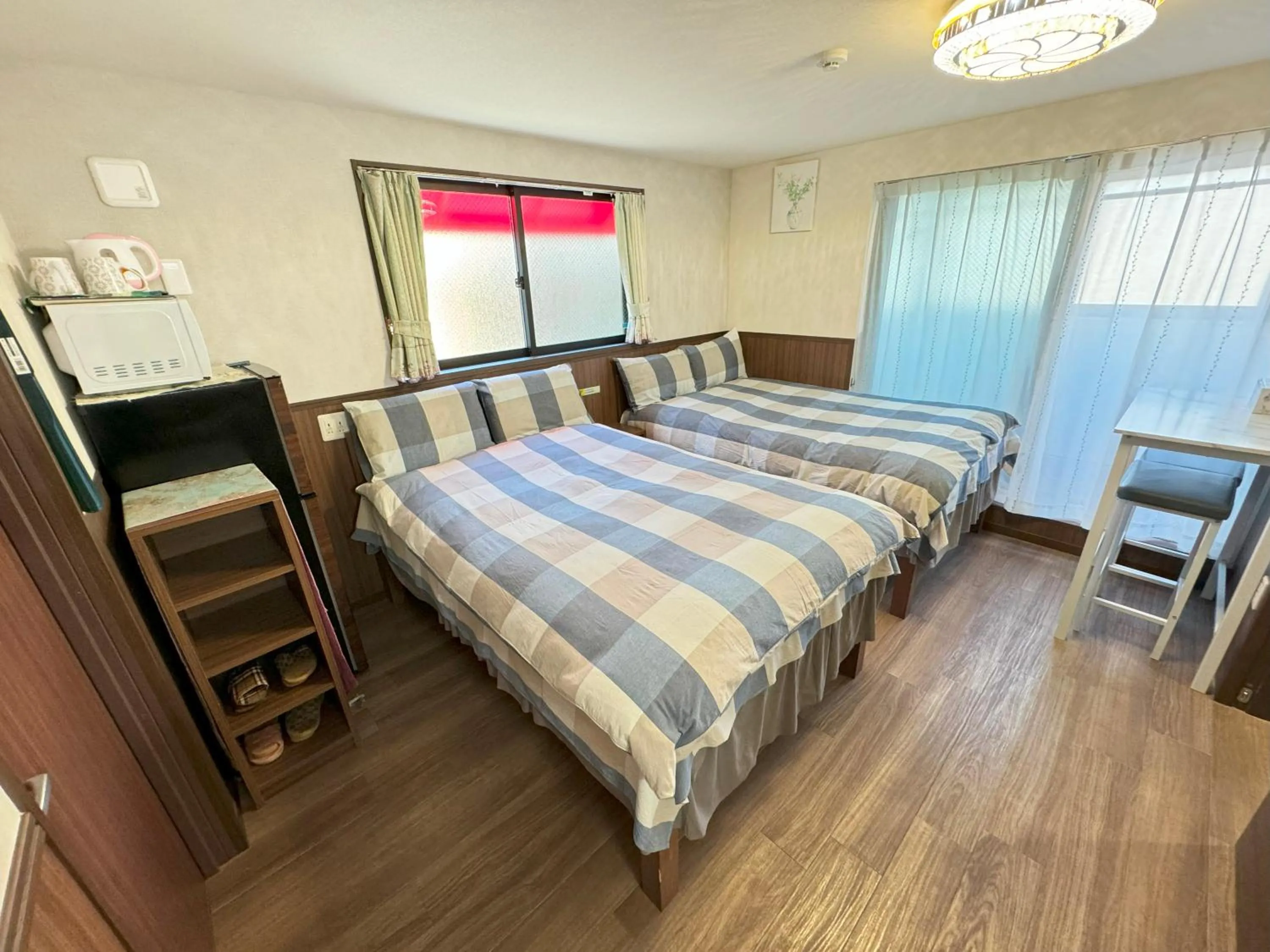 Bed in SHINJUKU WARM VILLA I