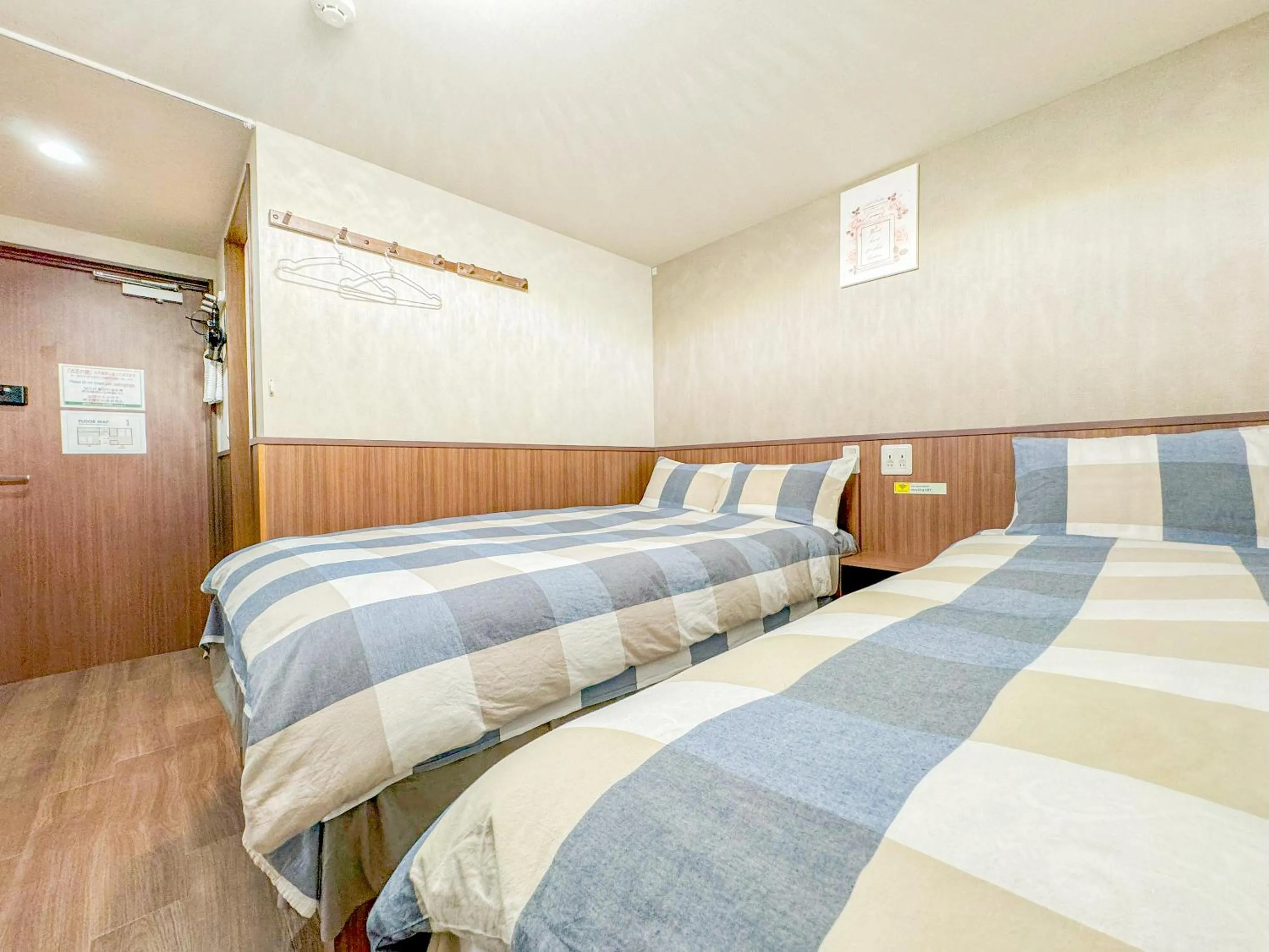 Bed in SHINJUKU WARM VILLA I