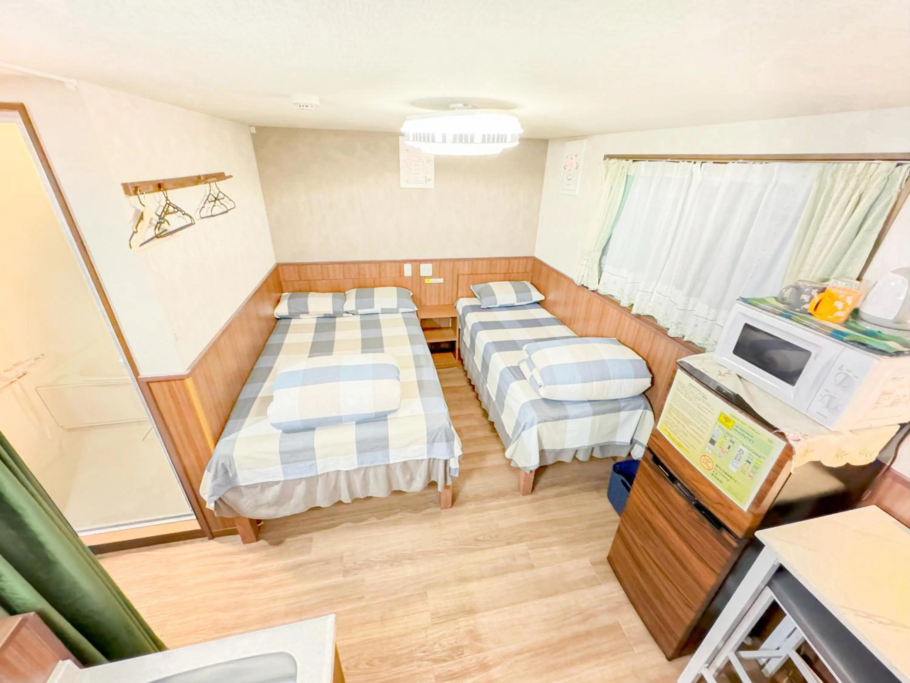 Bed in SHINJUKU WARM VILLA I