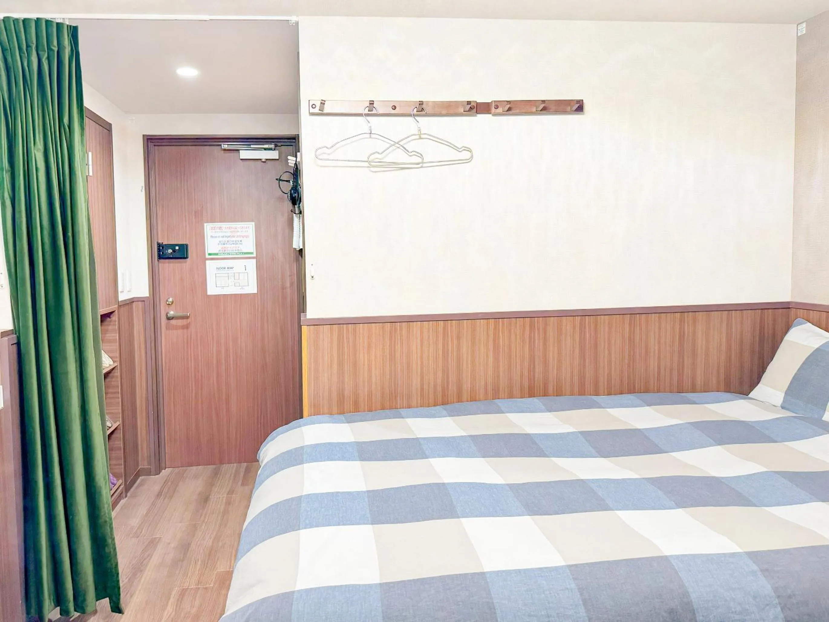 Bed in SHINJUKU WARM VILLA I