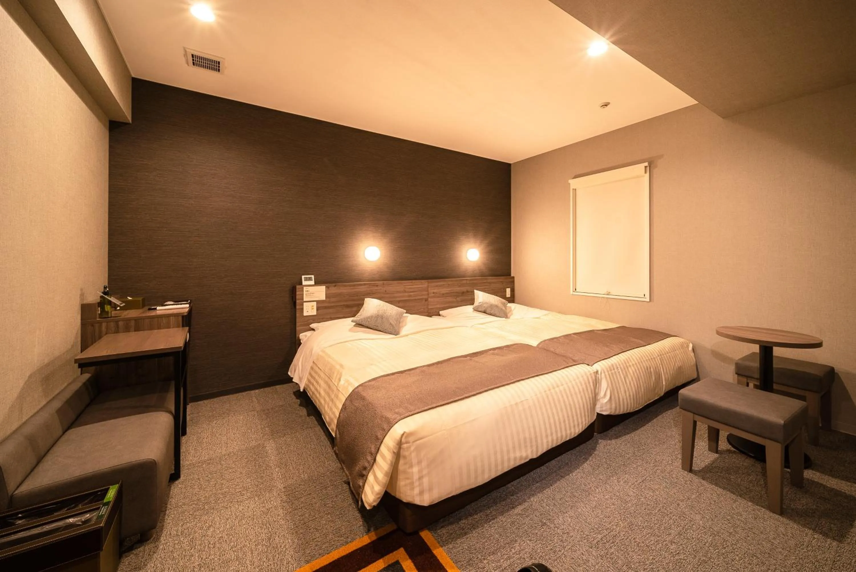 Bed in Super Hotel Premier Ikebukuro Natural Hot Spring