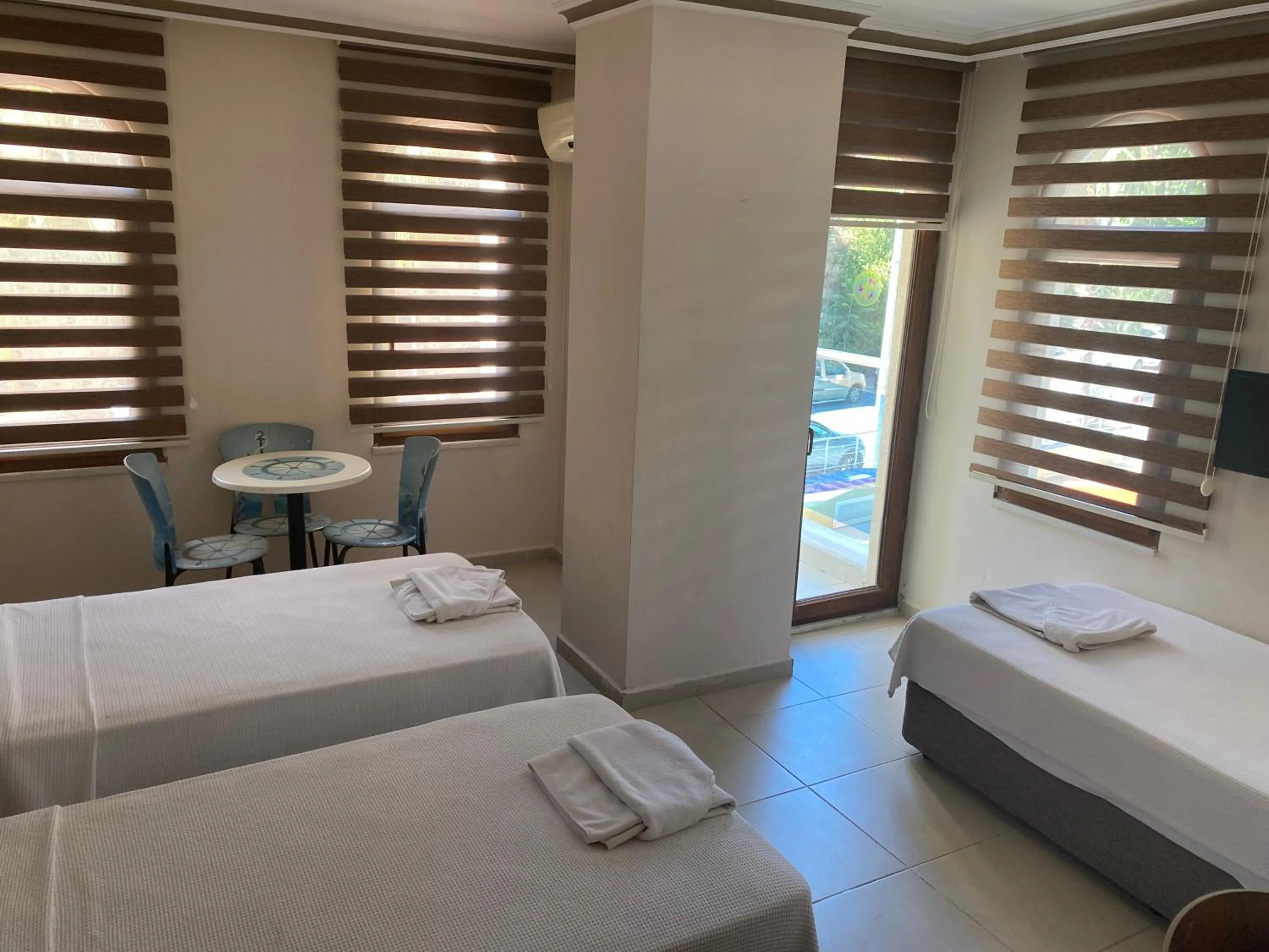 Bed in Astoria Beach Hotel