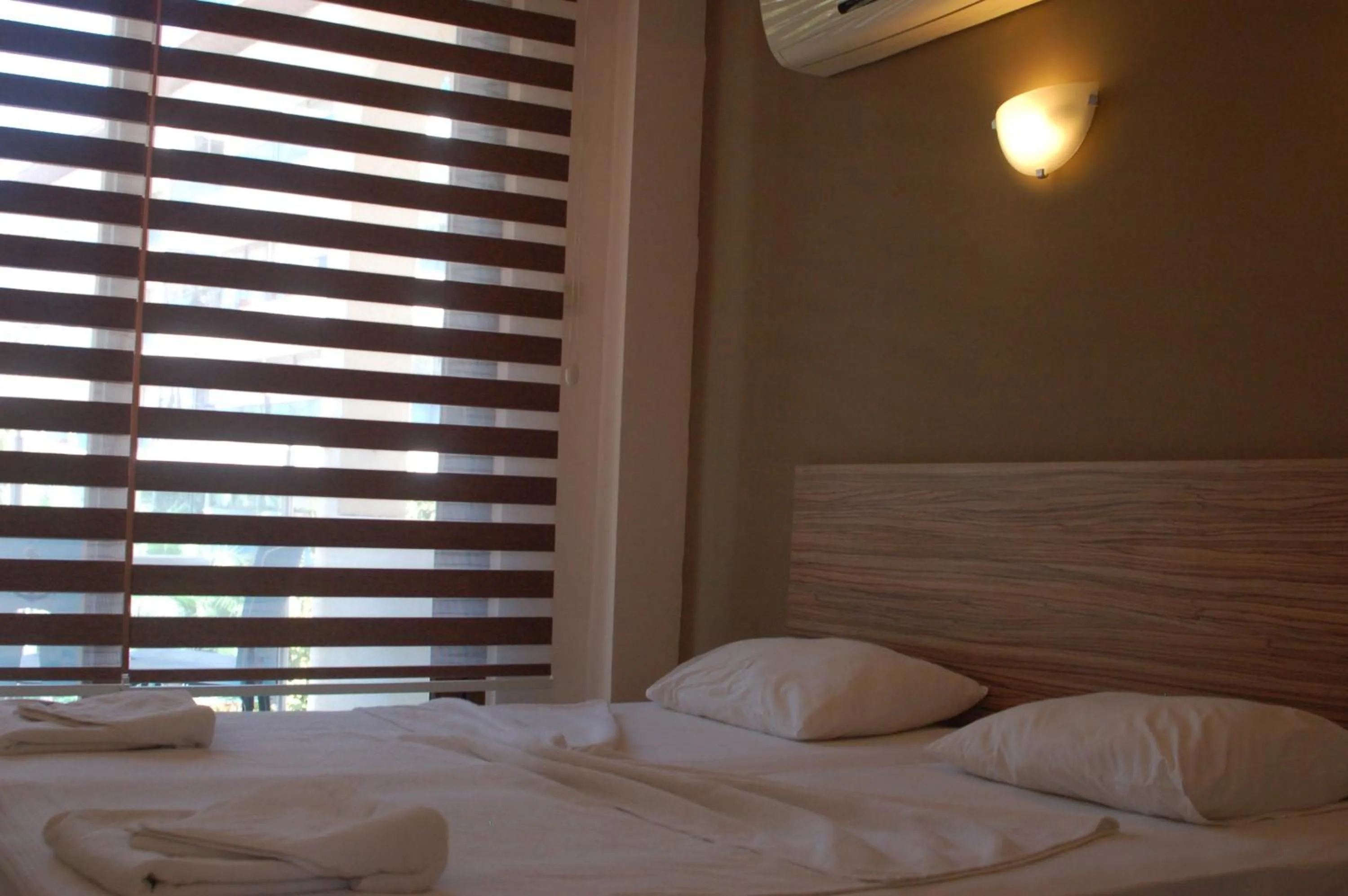 Bed in Astoria Beach Hotel