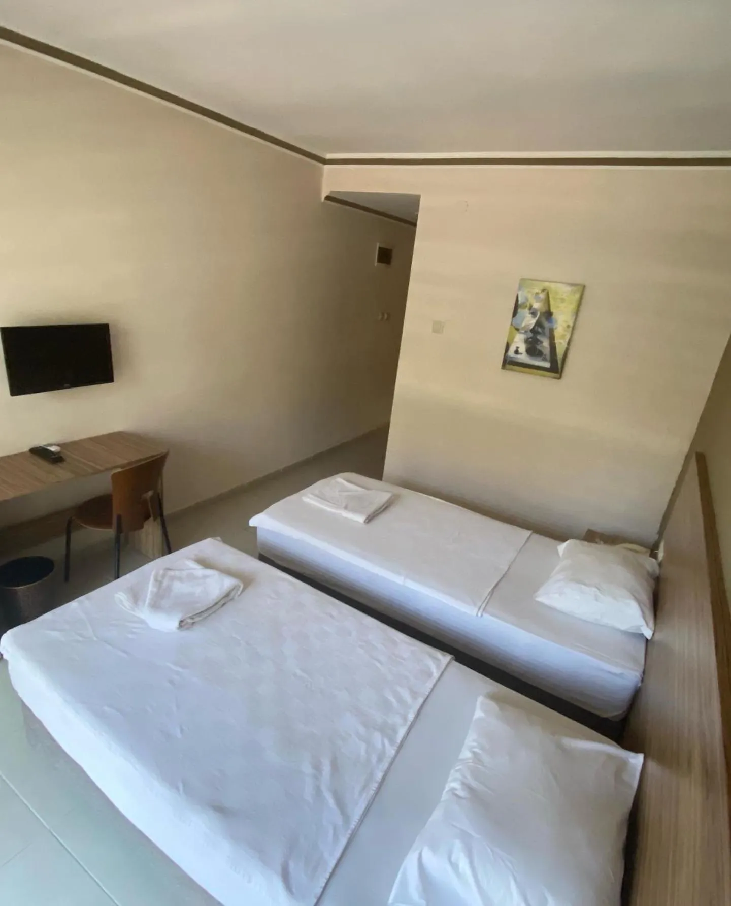 Bed in Astoria Beach Hotel