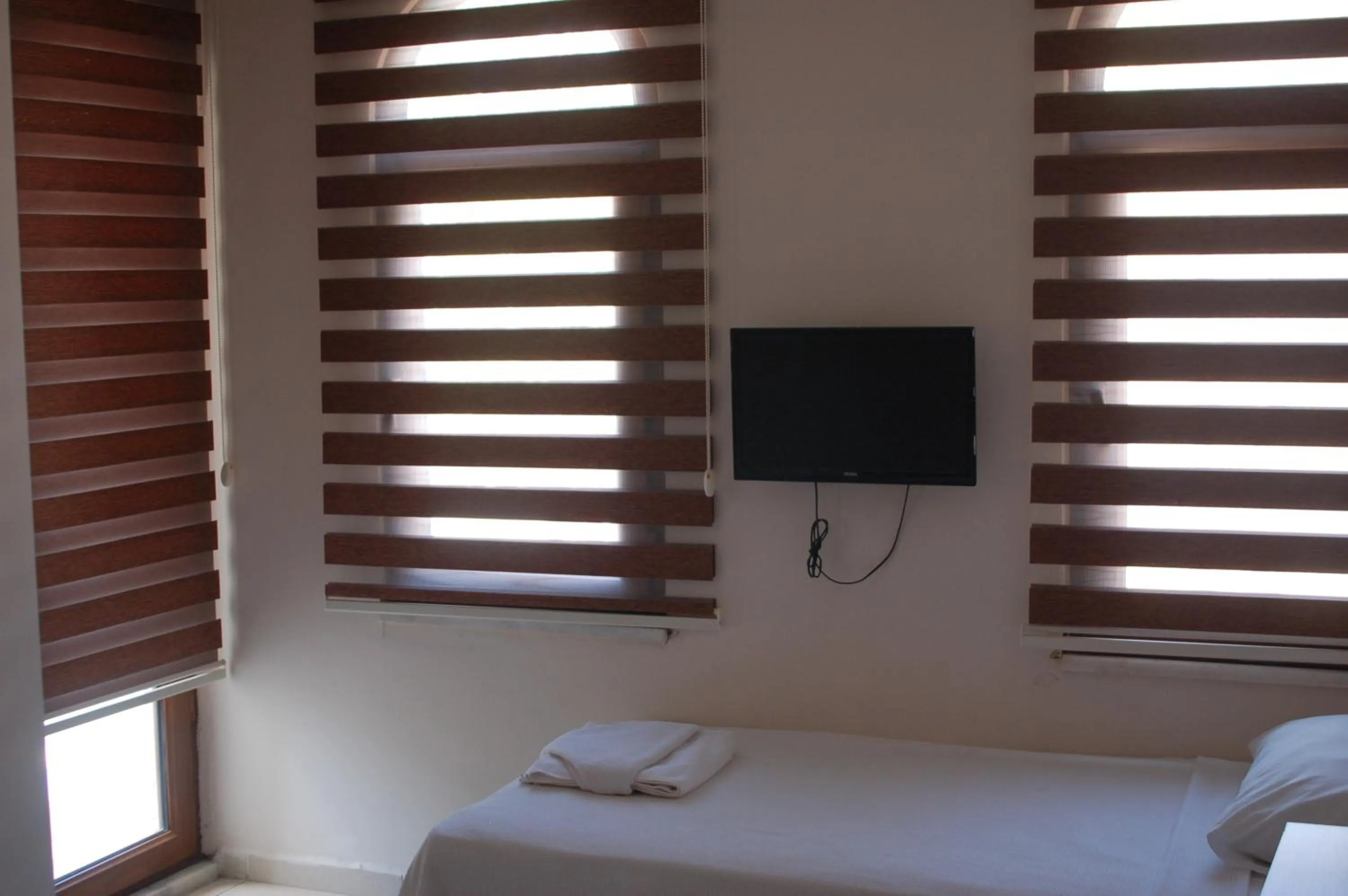 Bed in Astoria Beach Hotel