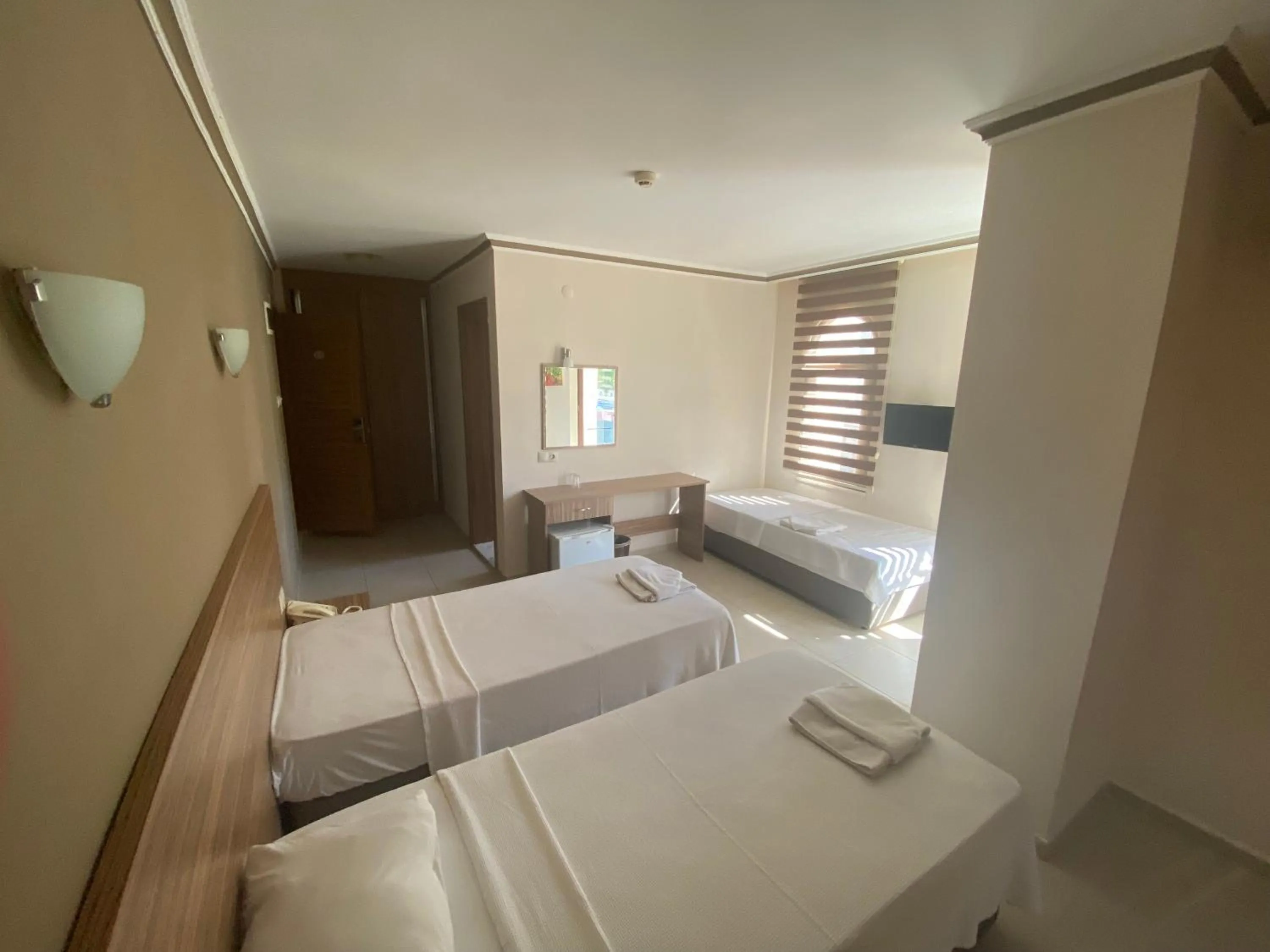 Bed in Astoria Beach Hotel