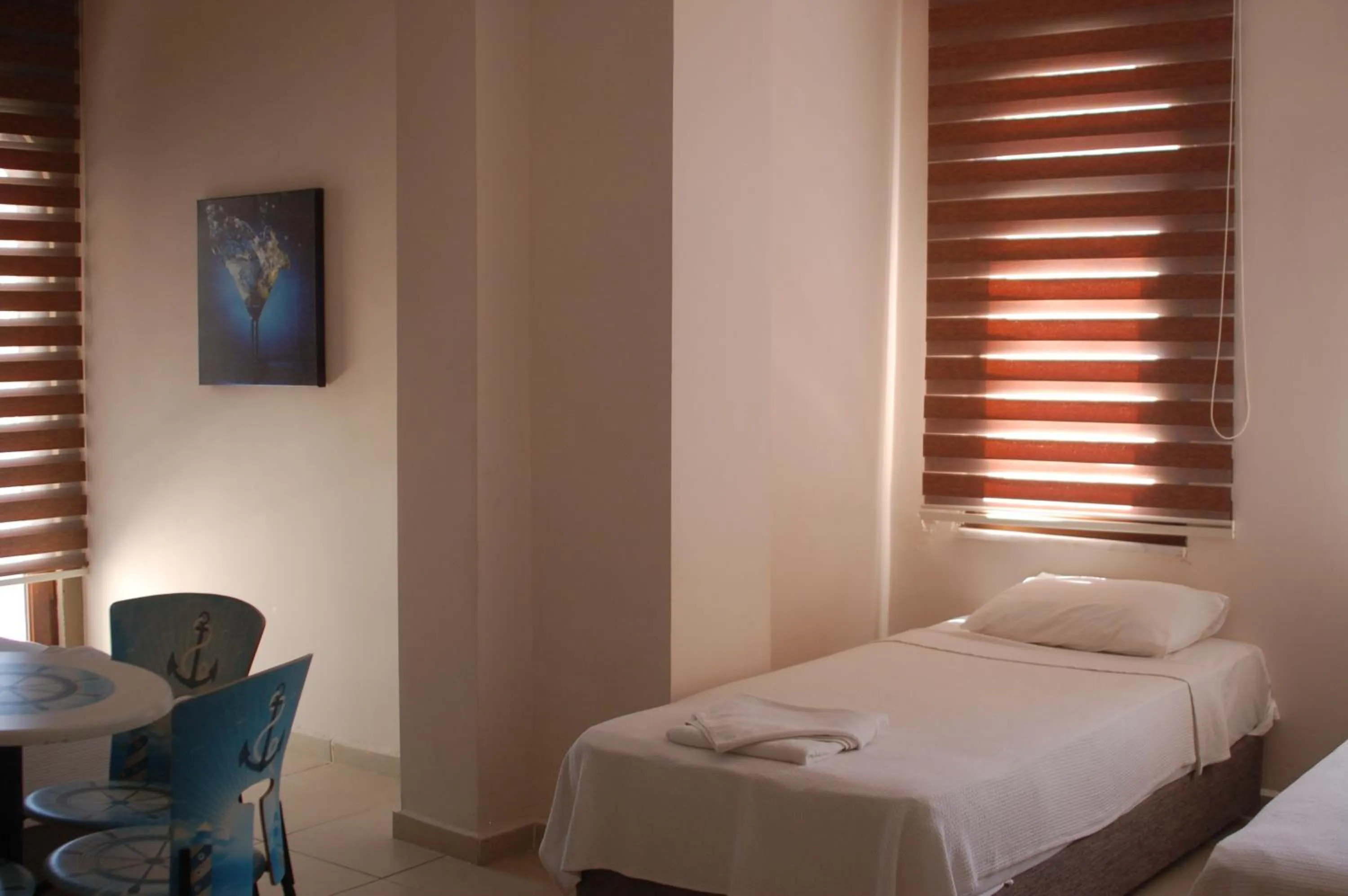 Bed in Astoria Beach Hotel