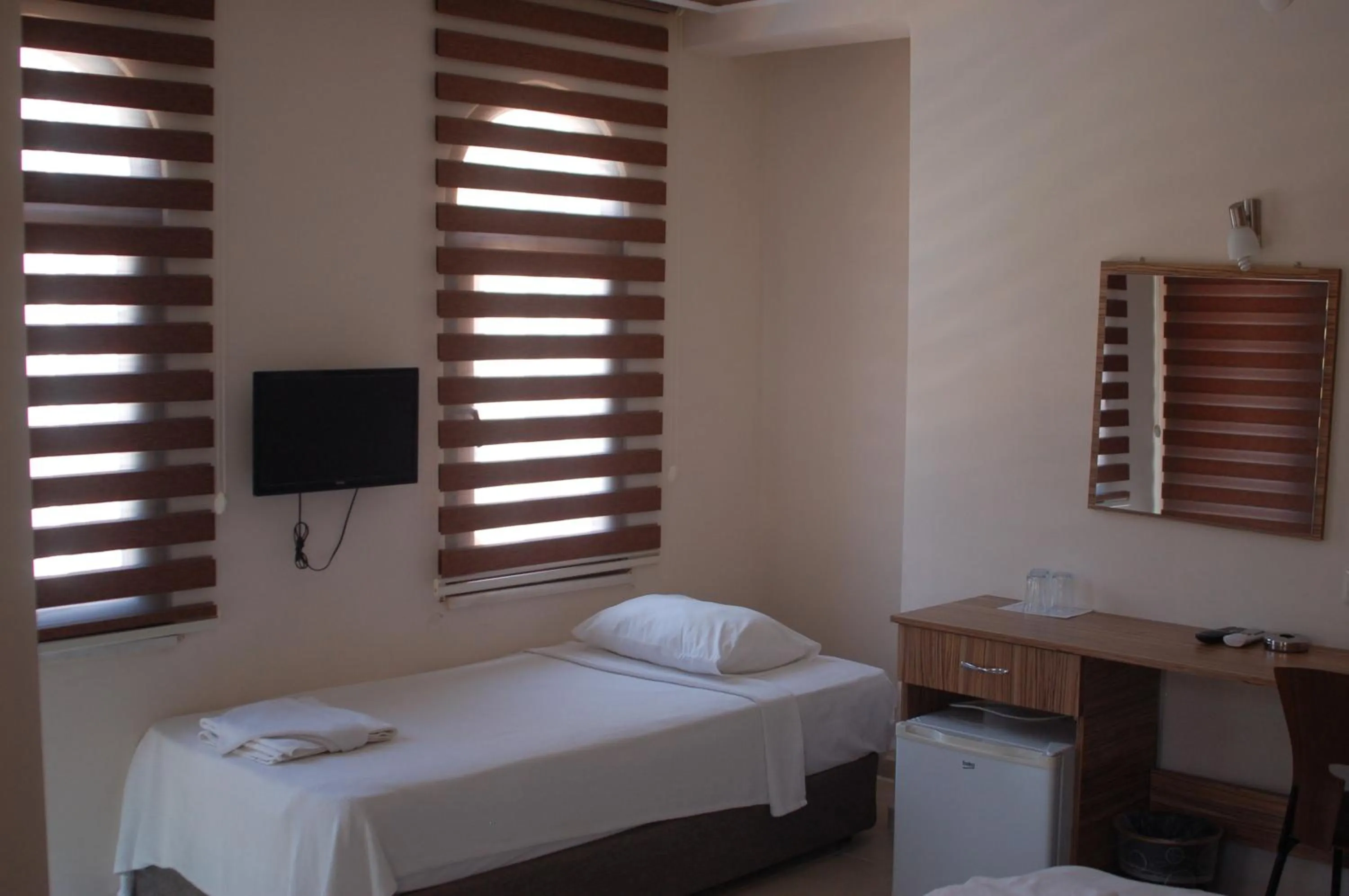 Bed in Astoria Beach Hotel