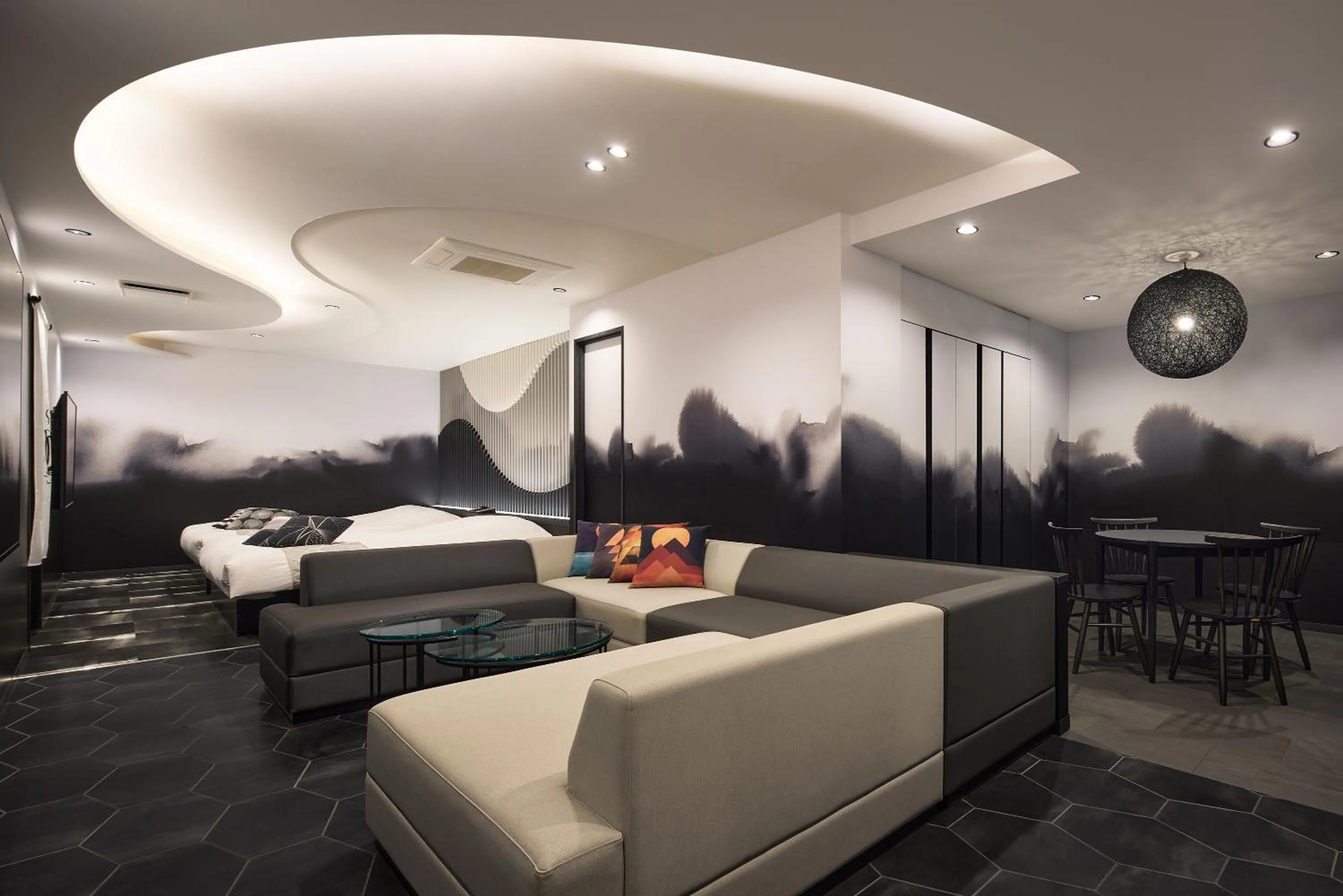 Living room, Bed in Yatomi Hotel Nuqu Natural Hot Spring