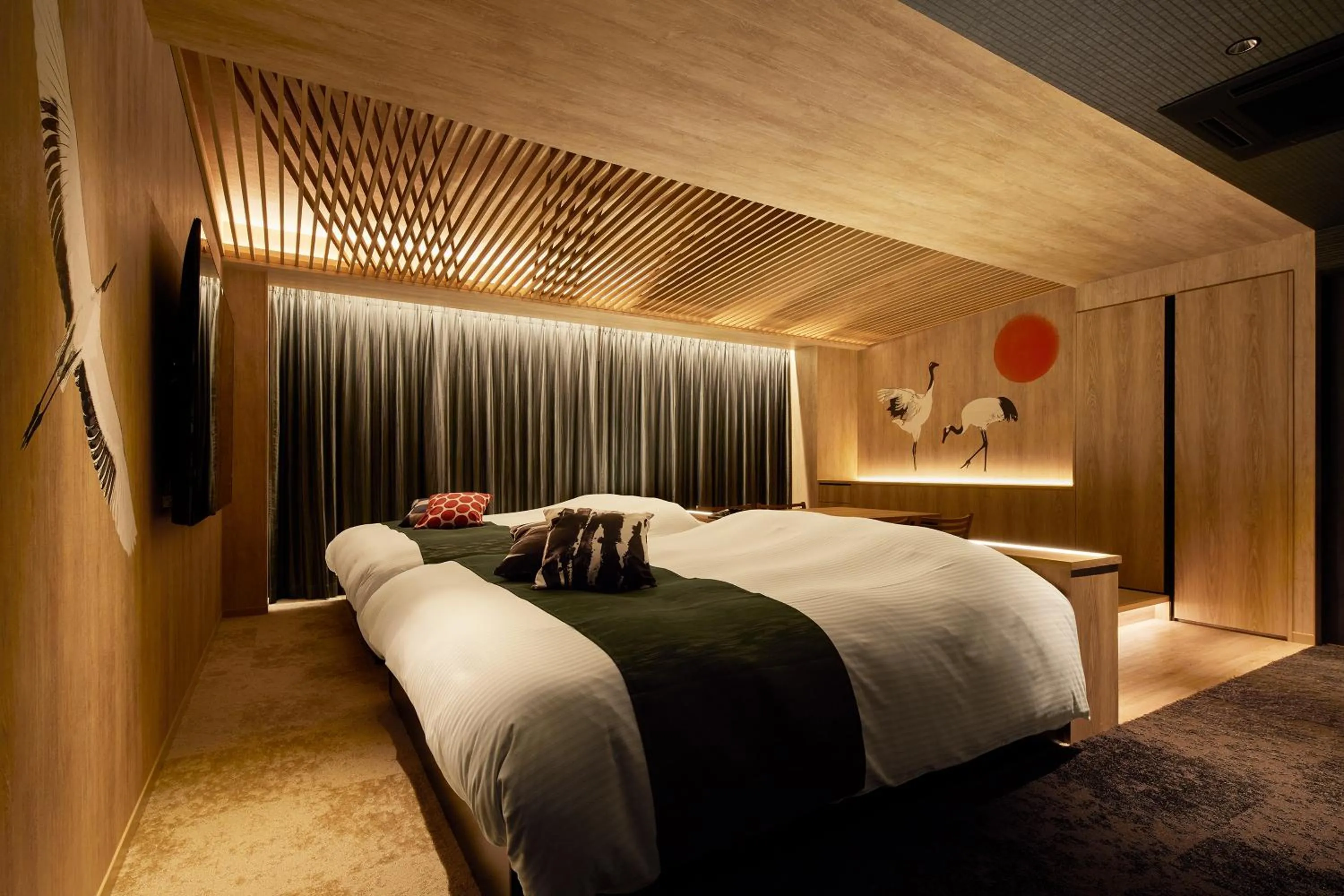 Bed in Yatomi Hotel Nuqu Natural Hot Spring