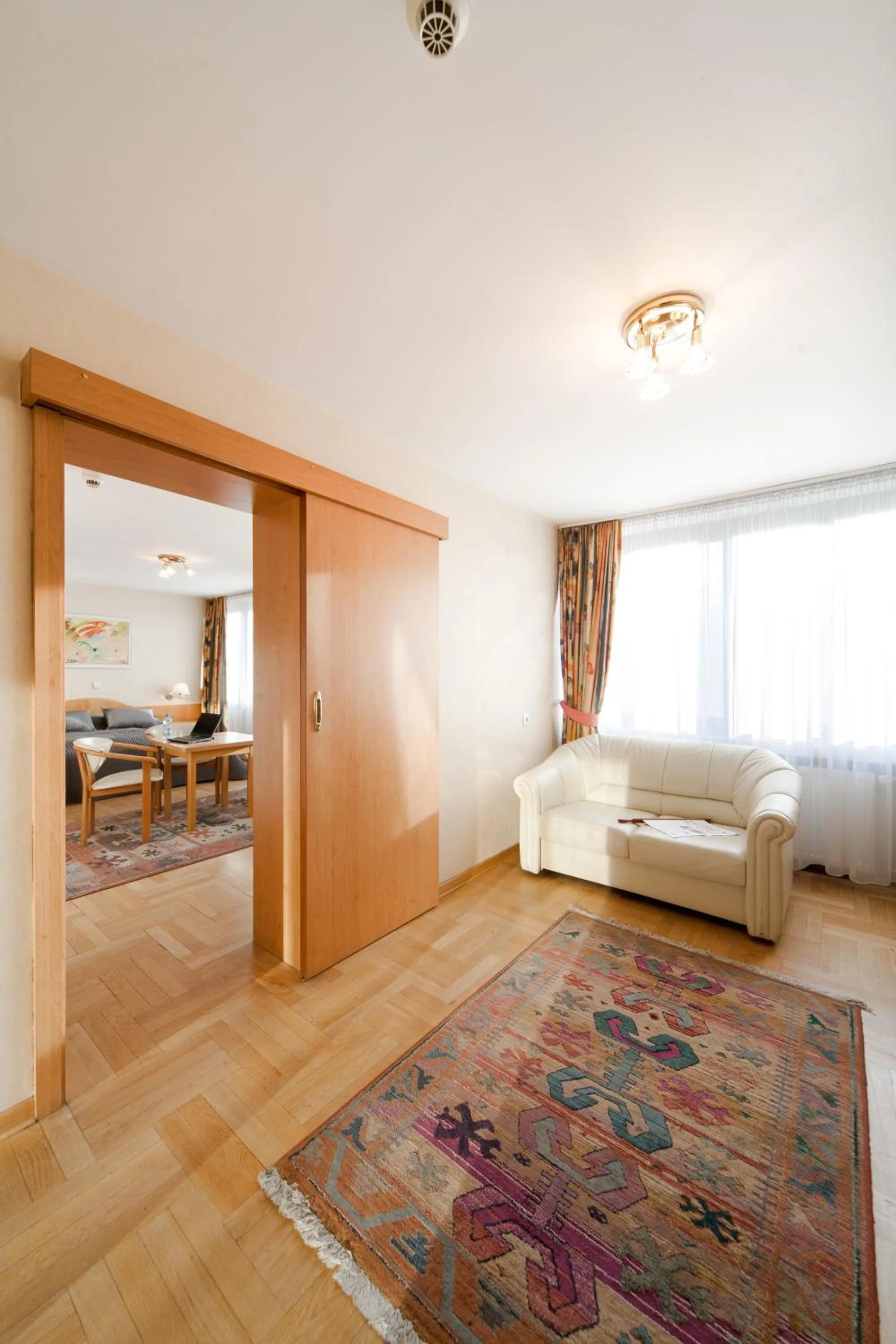 Seating area, Bed in Hotel Mazowiecki Łódź