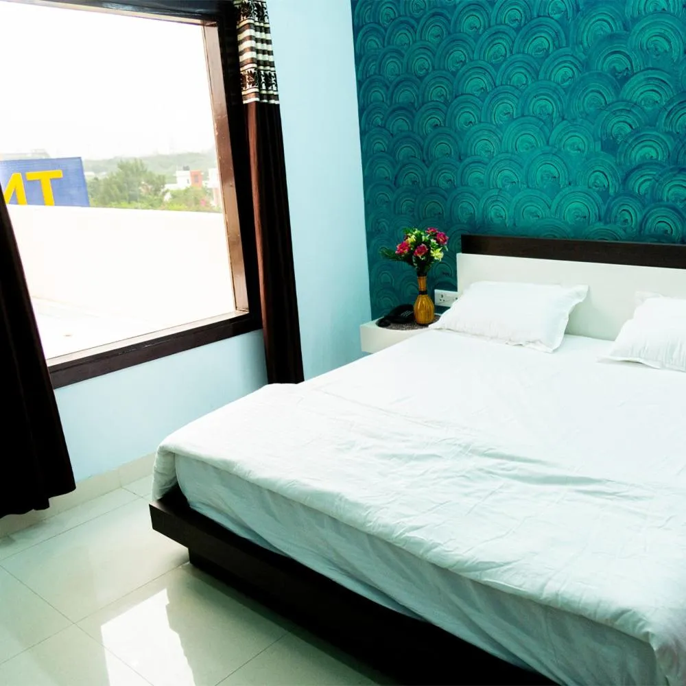 Bed in Jagdambey Hotel