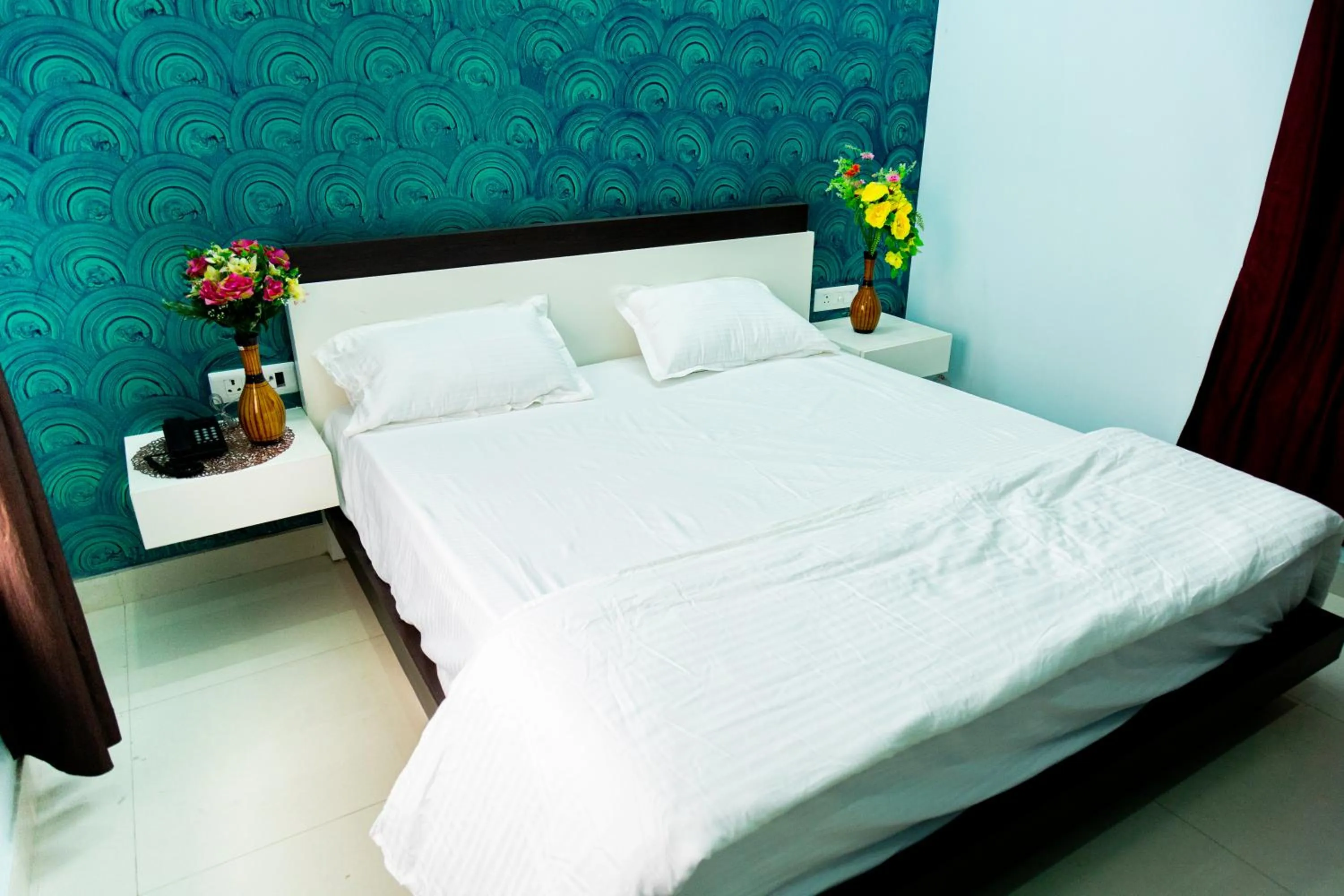 Bed in Jagdambey Hotel