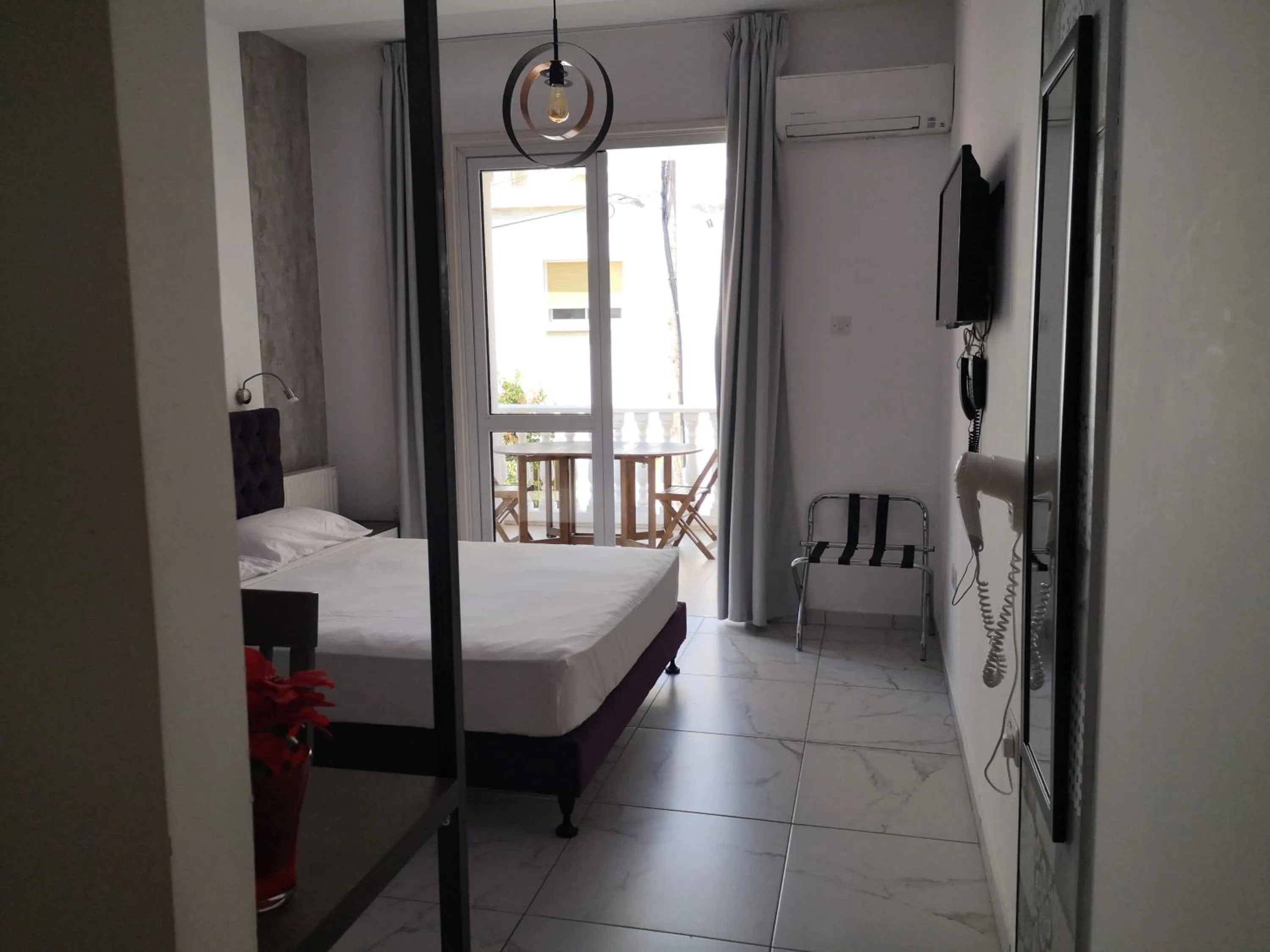 Photo of the whole room, Bed in St Elena Boutique Residence