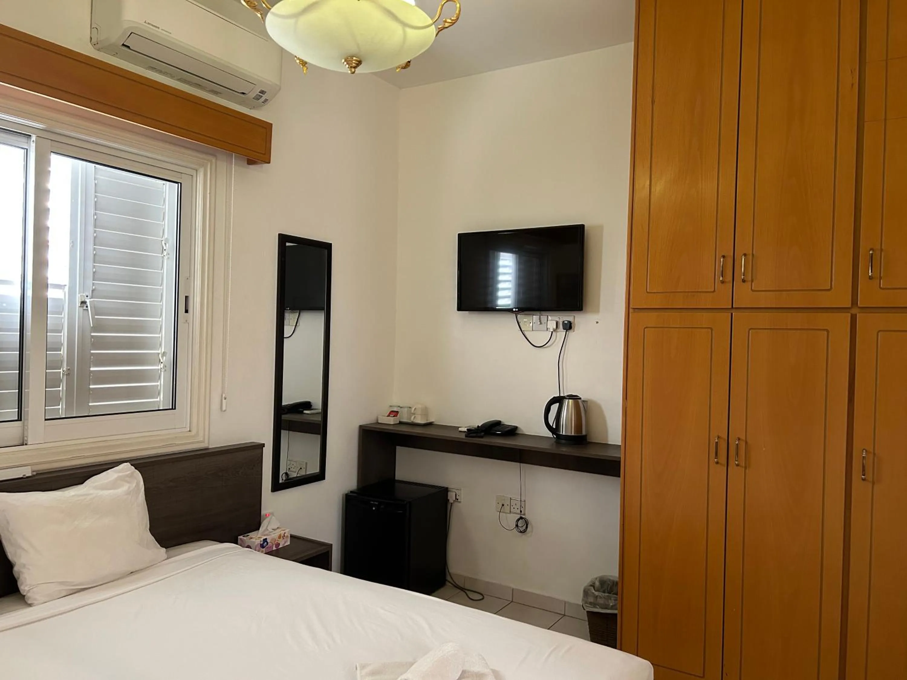 Bed in St Elena Boutique Residence