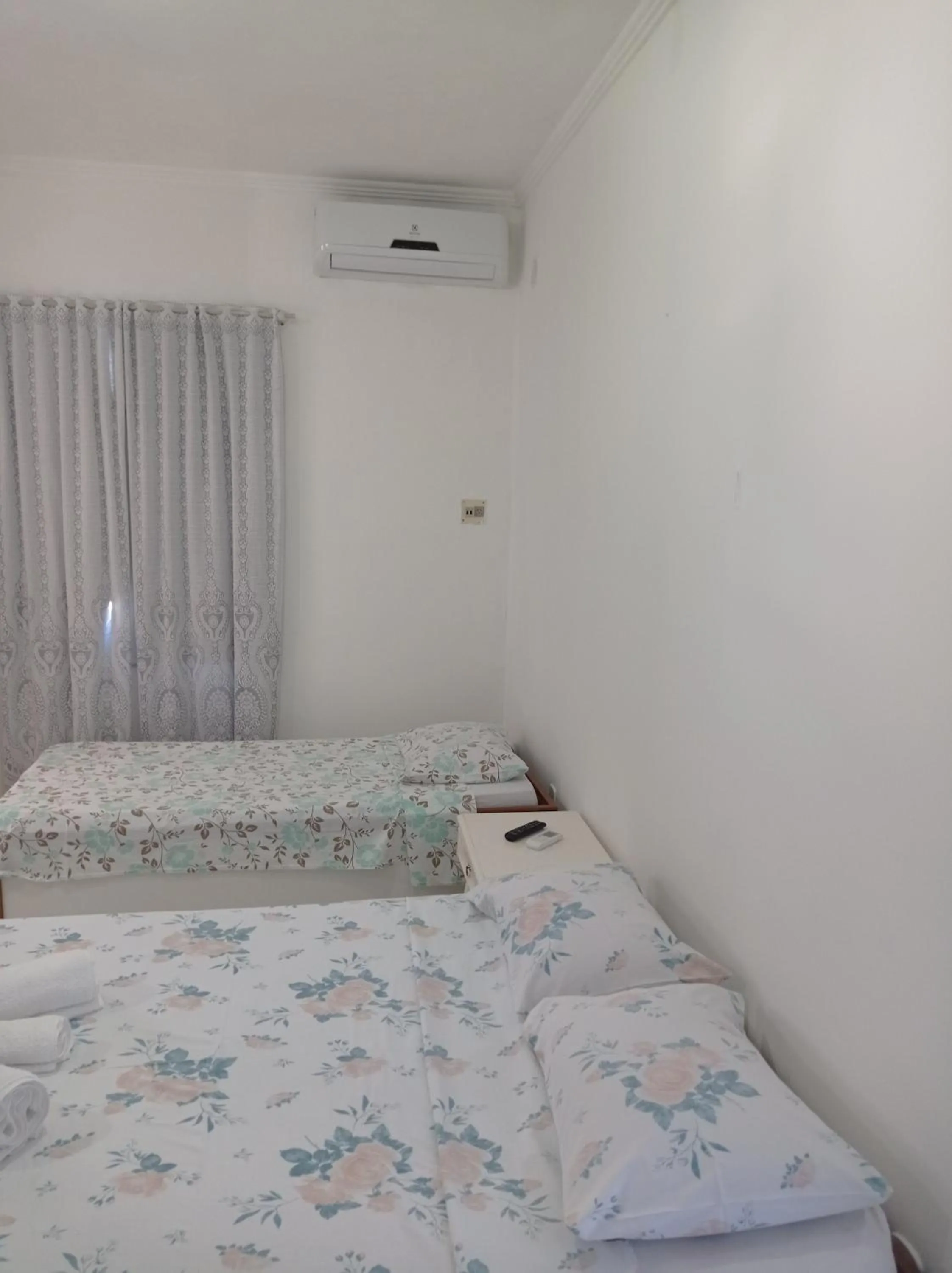 Bed in Pousada Aruamar