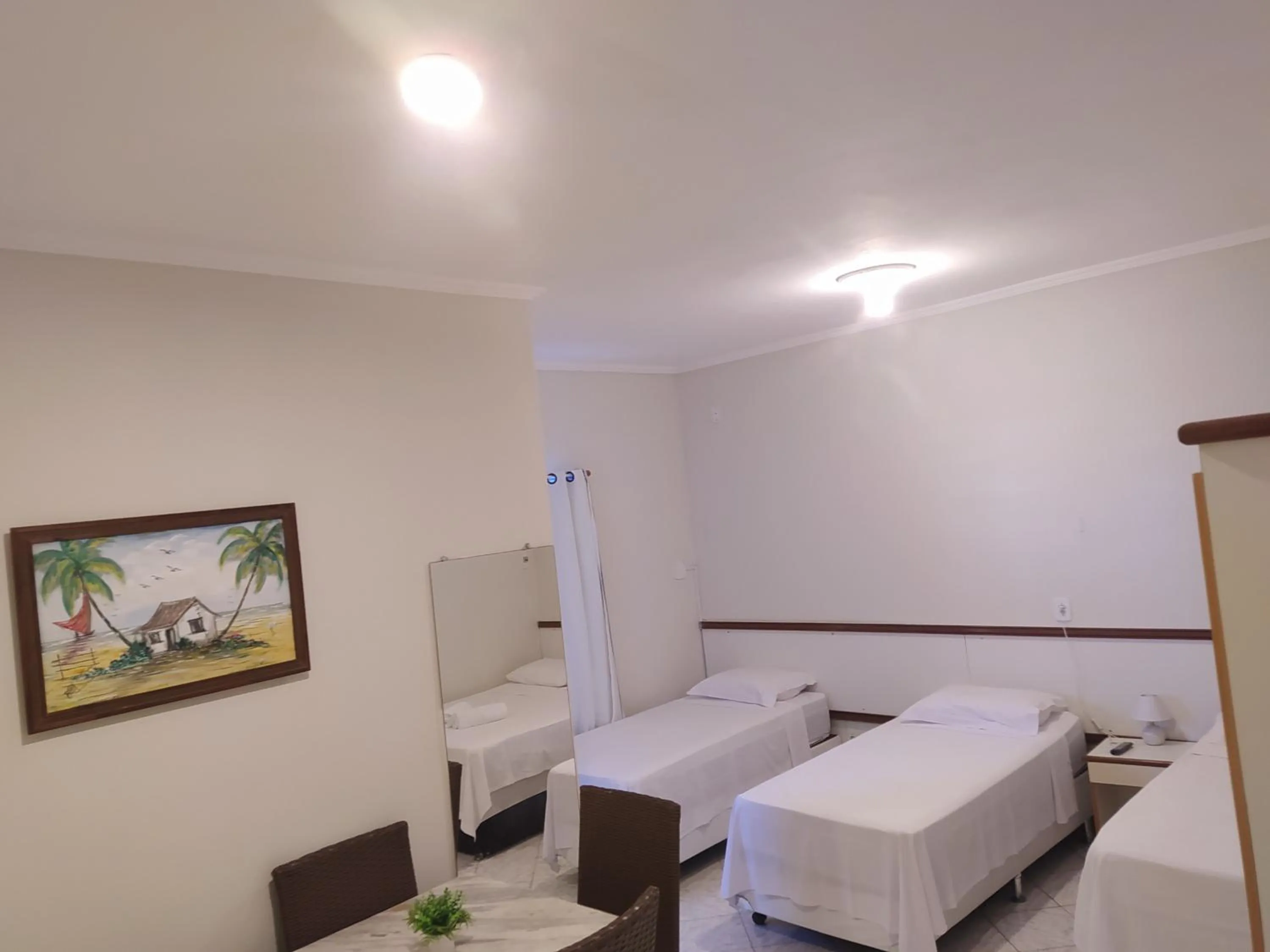 Bed in Pousada Aruamar