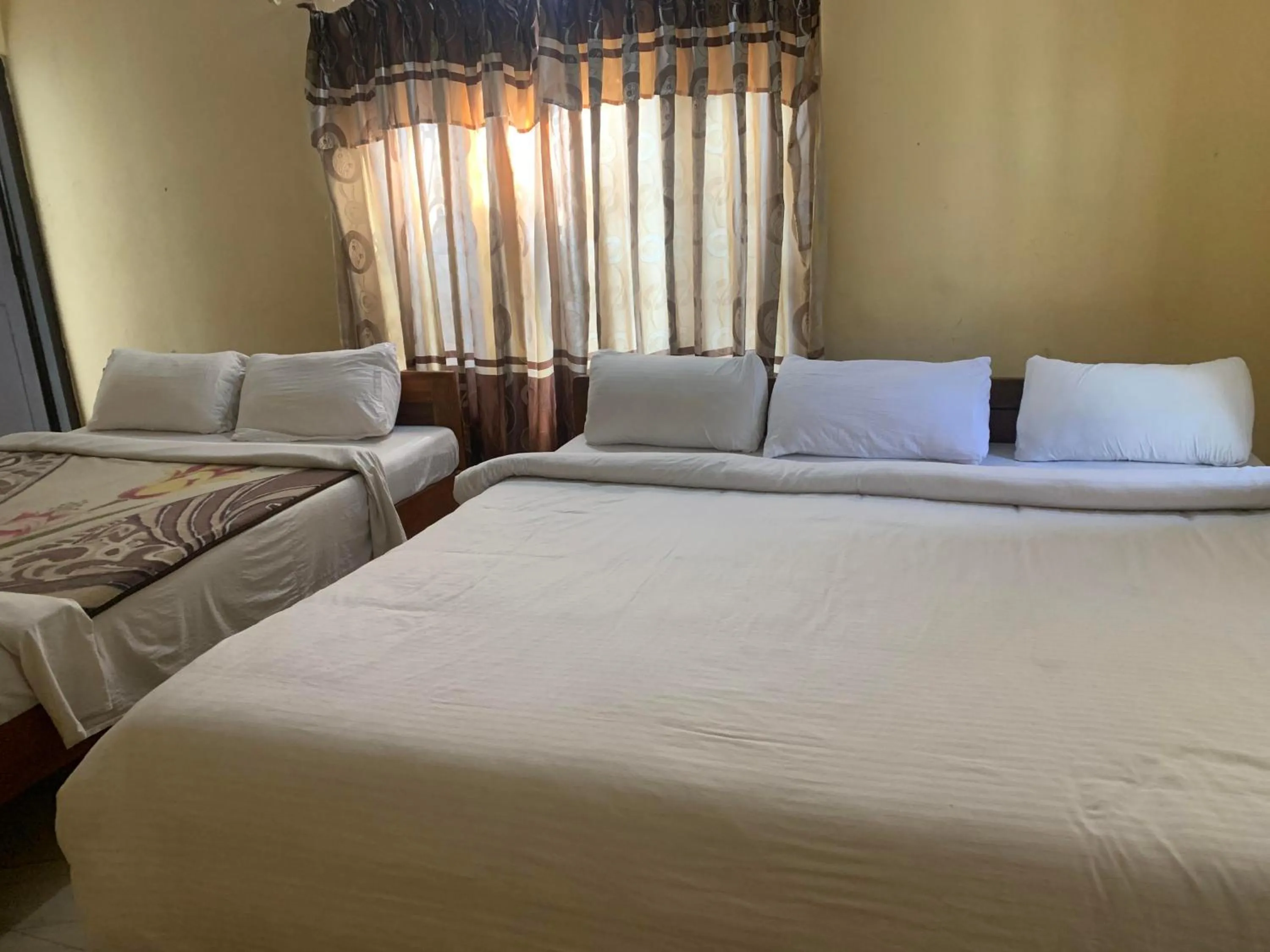 Bed in Hotel Peace Ganga Inn