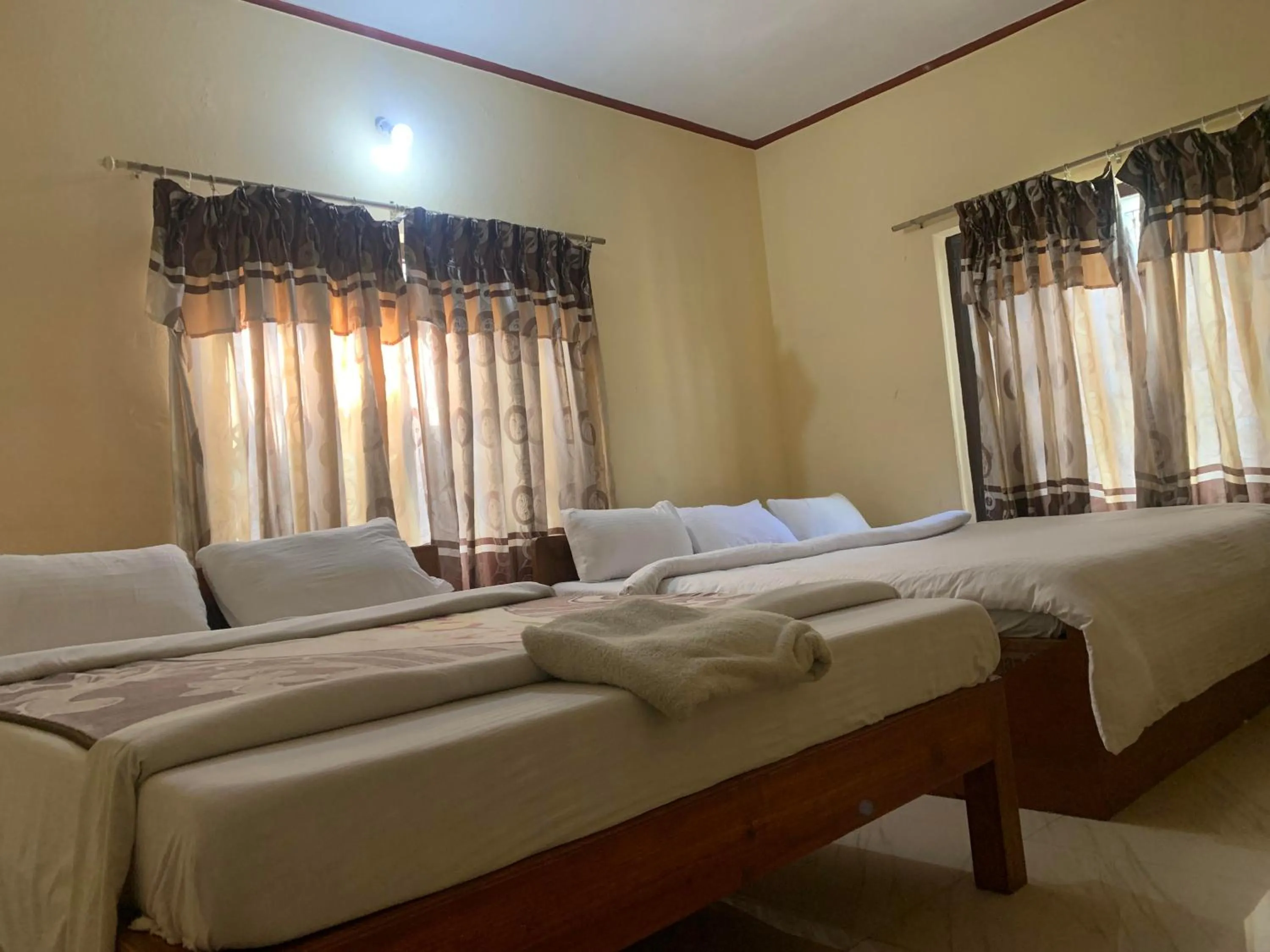 Bedroom, Bed in Hotel Peace Ganga Inn