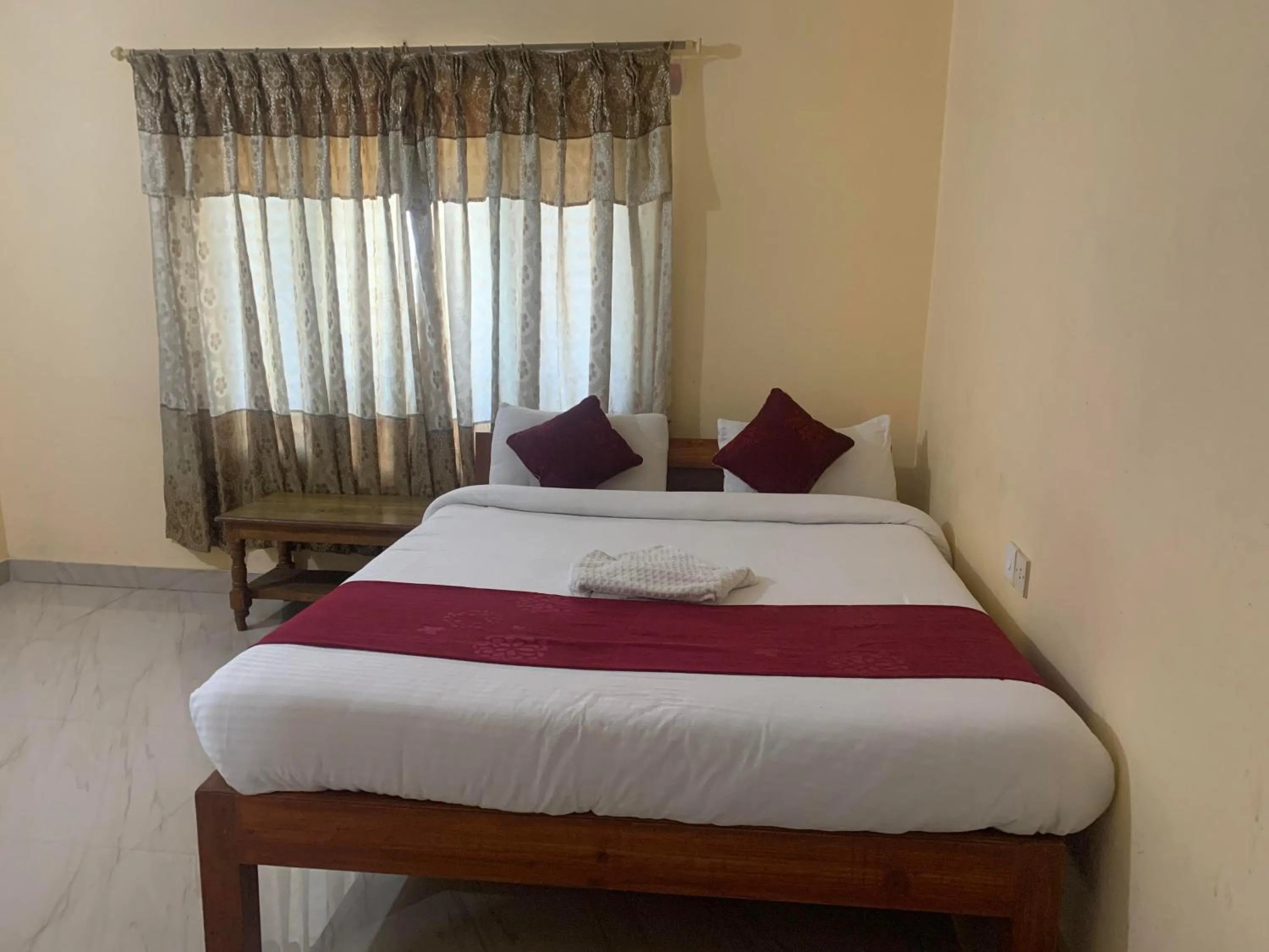 Bed in Hotel Peace Ganga Inn